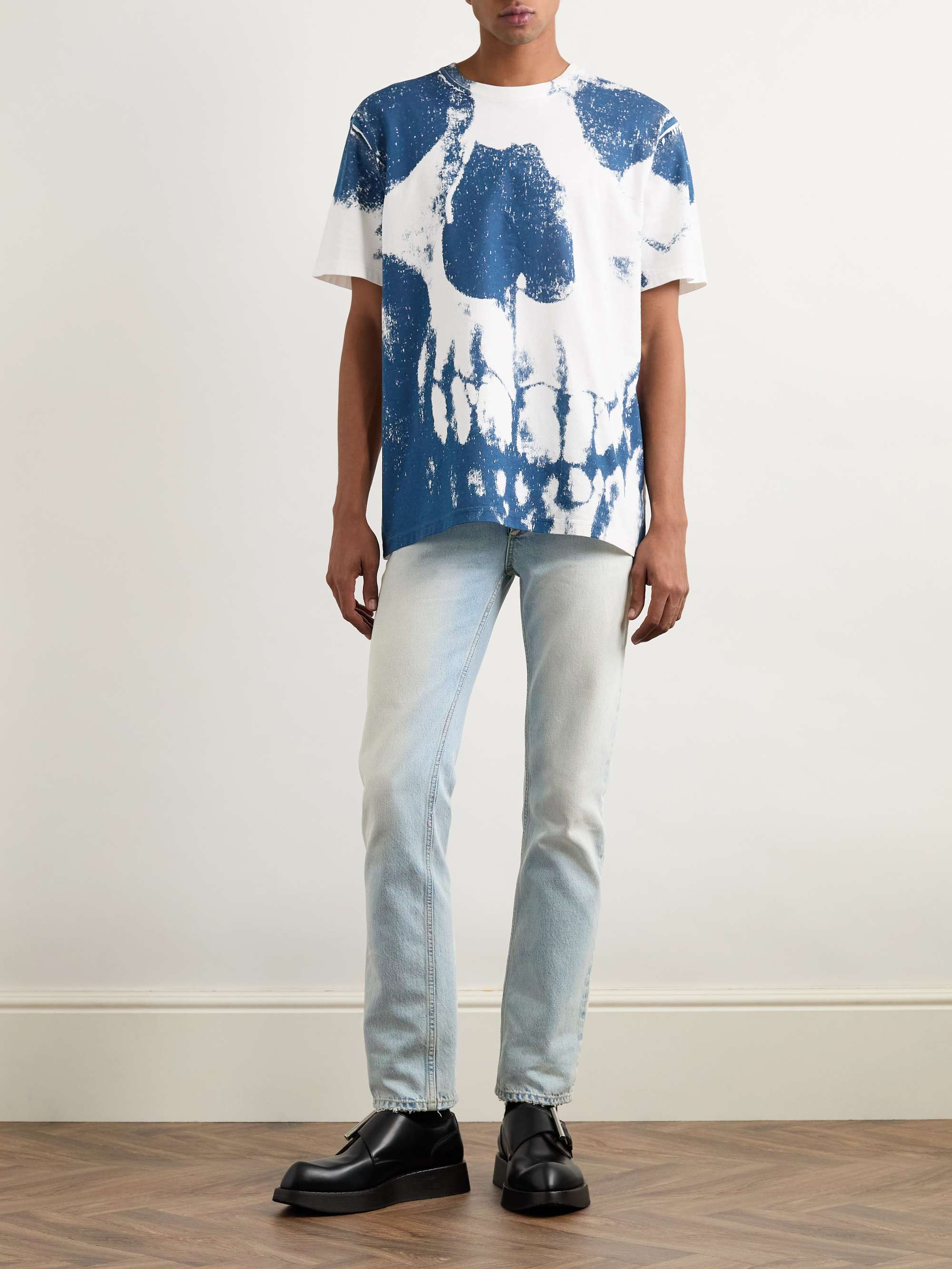 Slim-Fit Distressed Jeans view