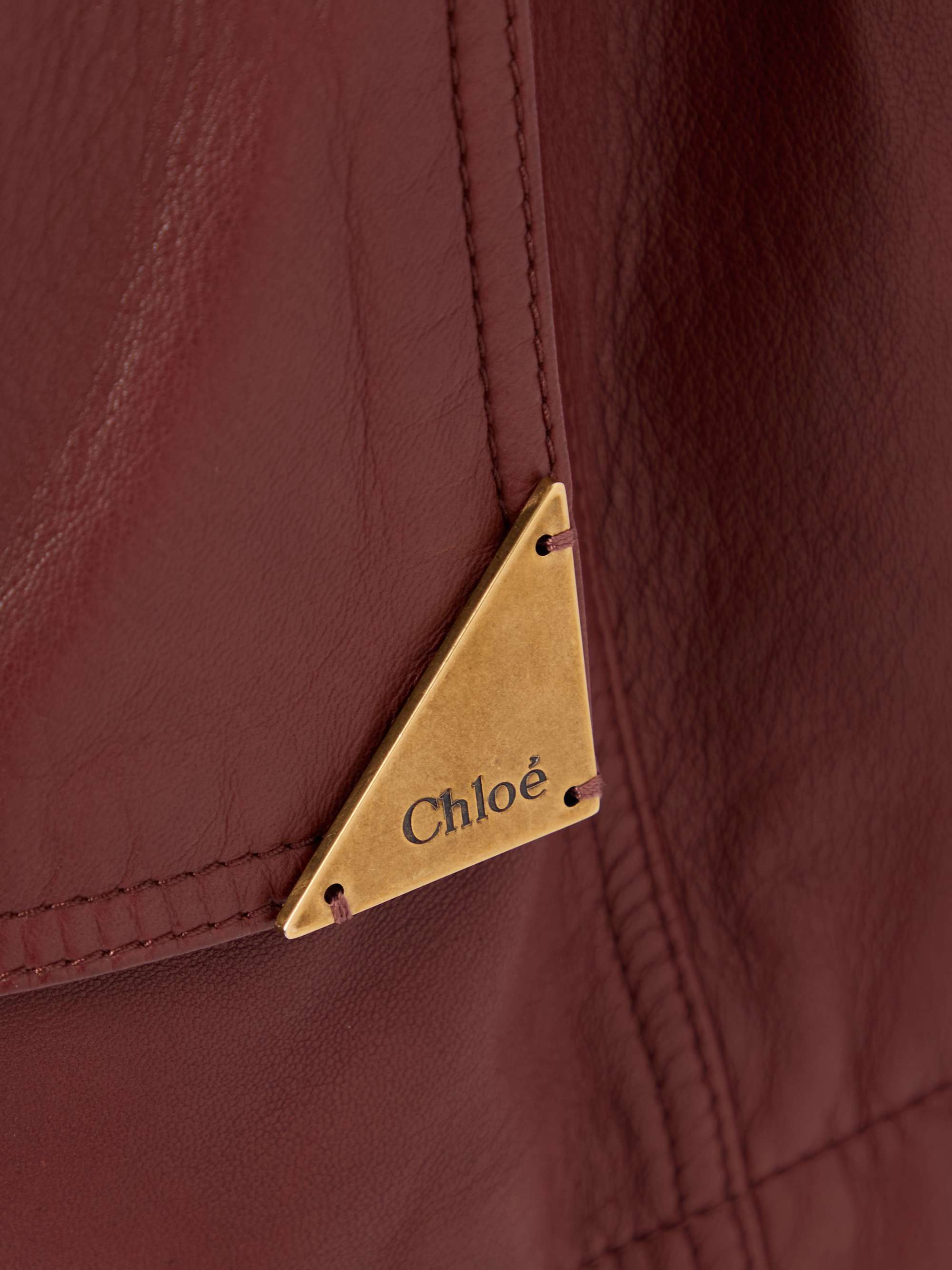 Buckled leather vest view