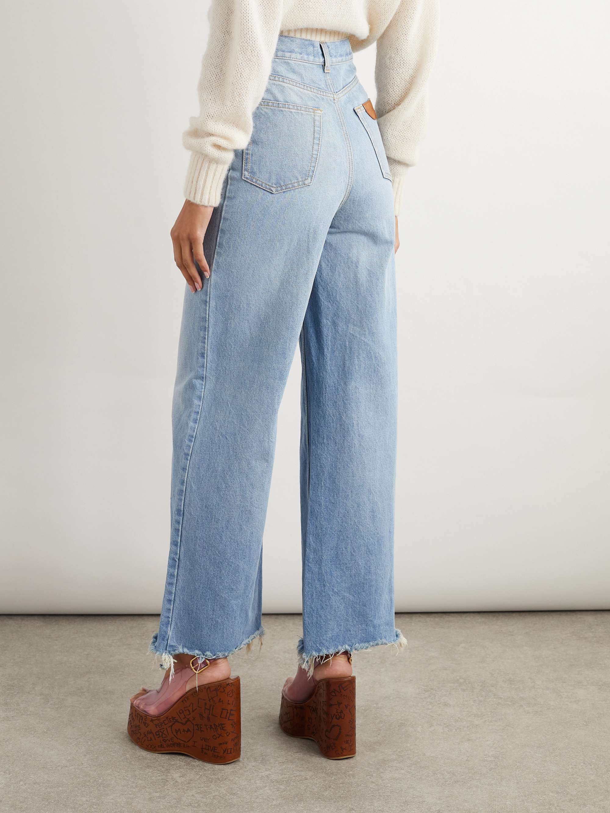Frayed high-rise wide-leg jeans view