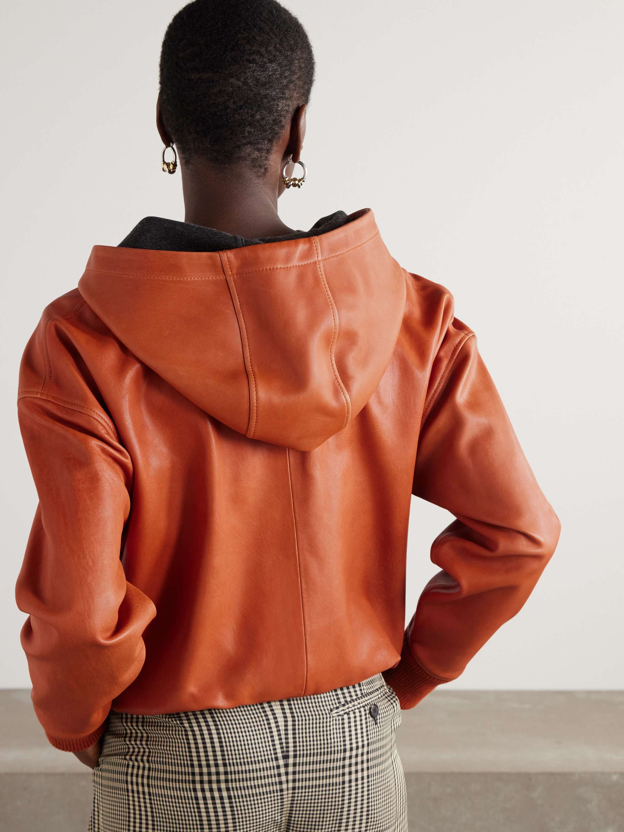 Hooded draped leather jacket view