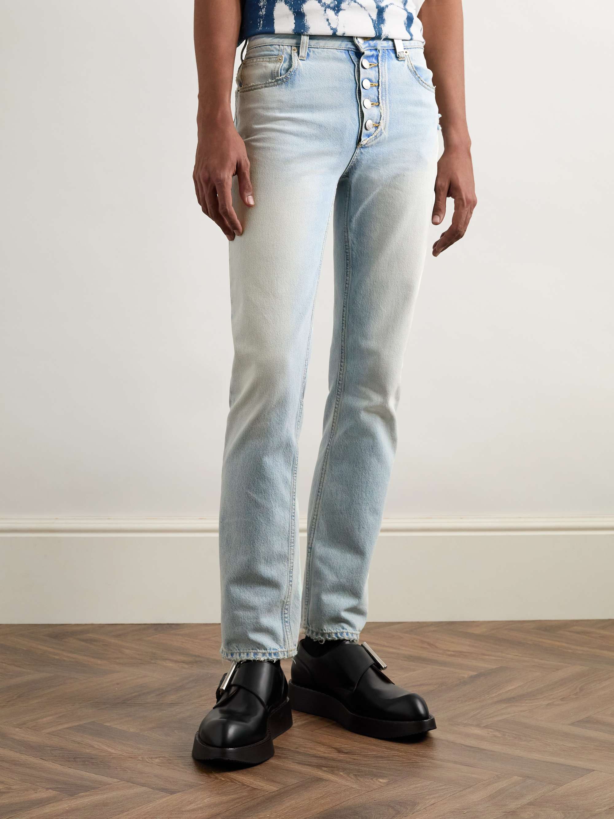 Slim-Fit Distressed Jeans view