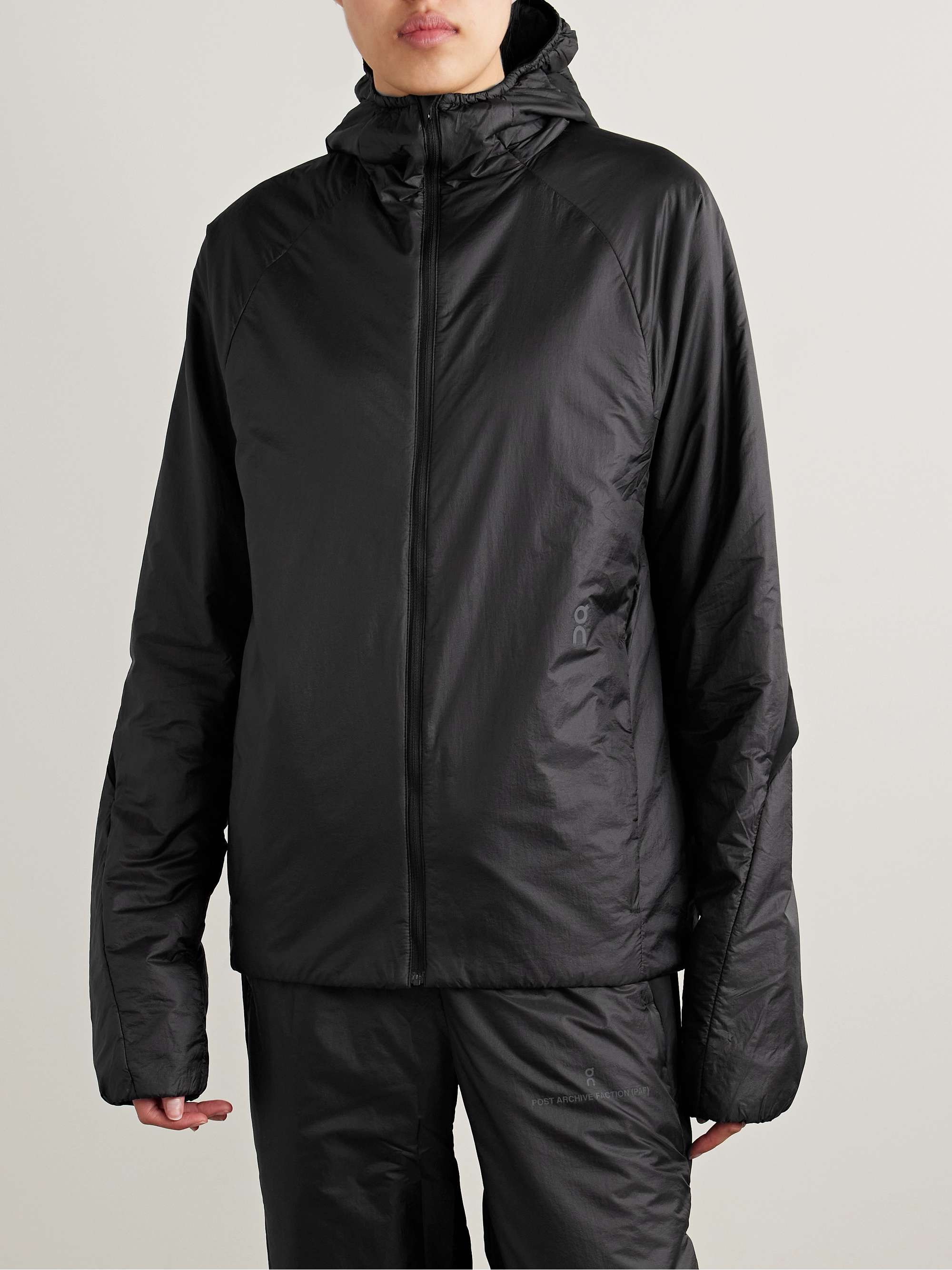 + POST ARCHIVE FACTION Zero hooded padded paneled recycled-shell jacket view