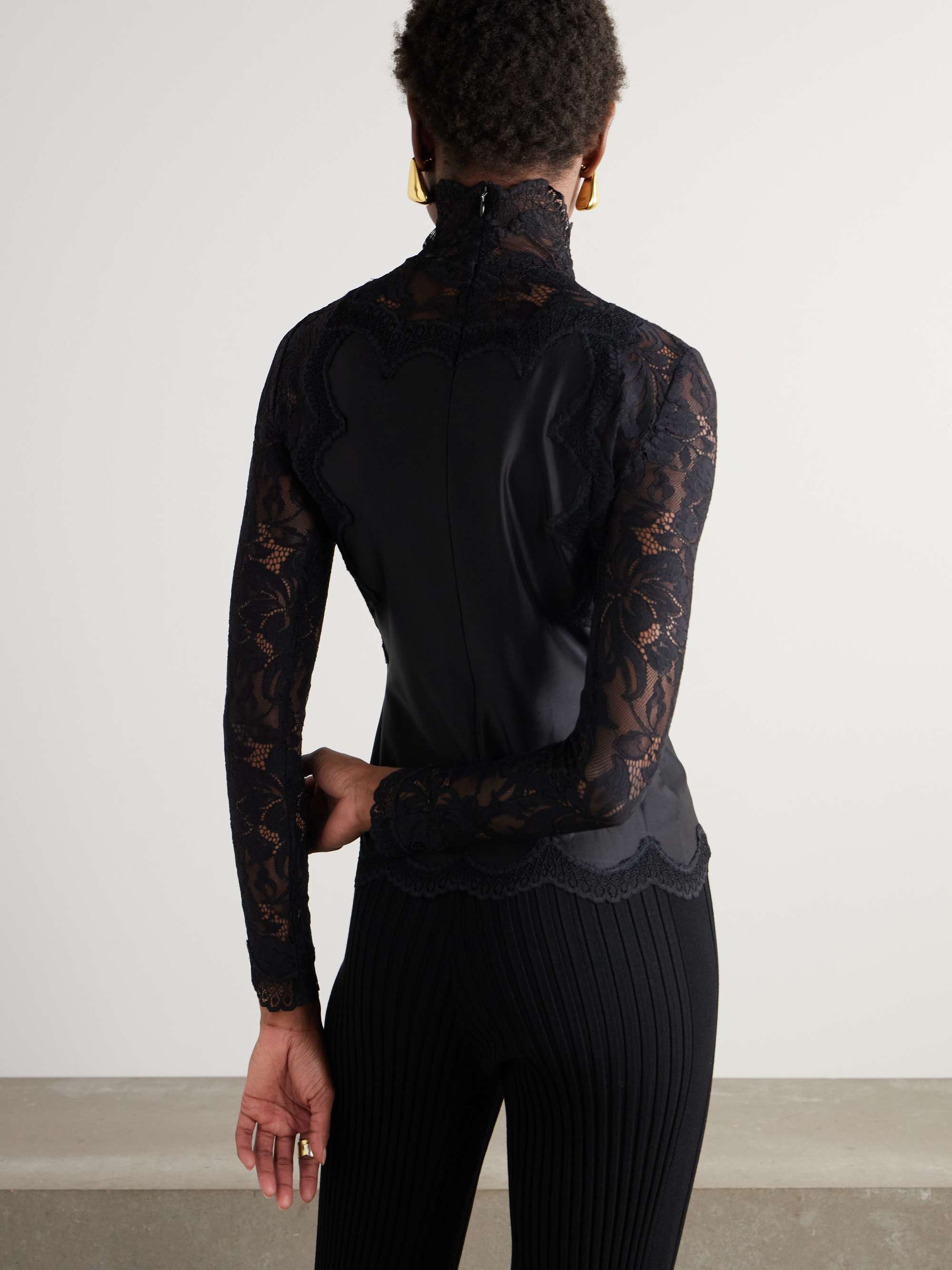Lace and satin turtleneck top view