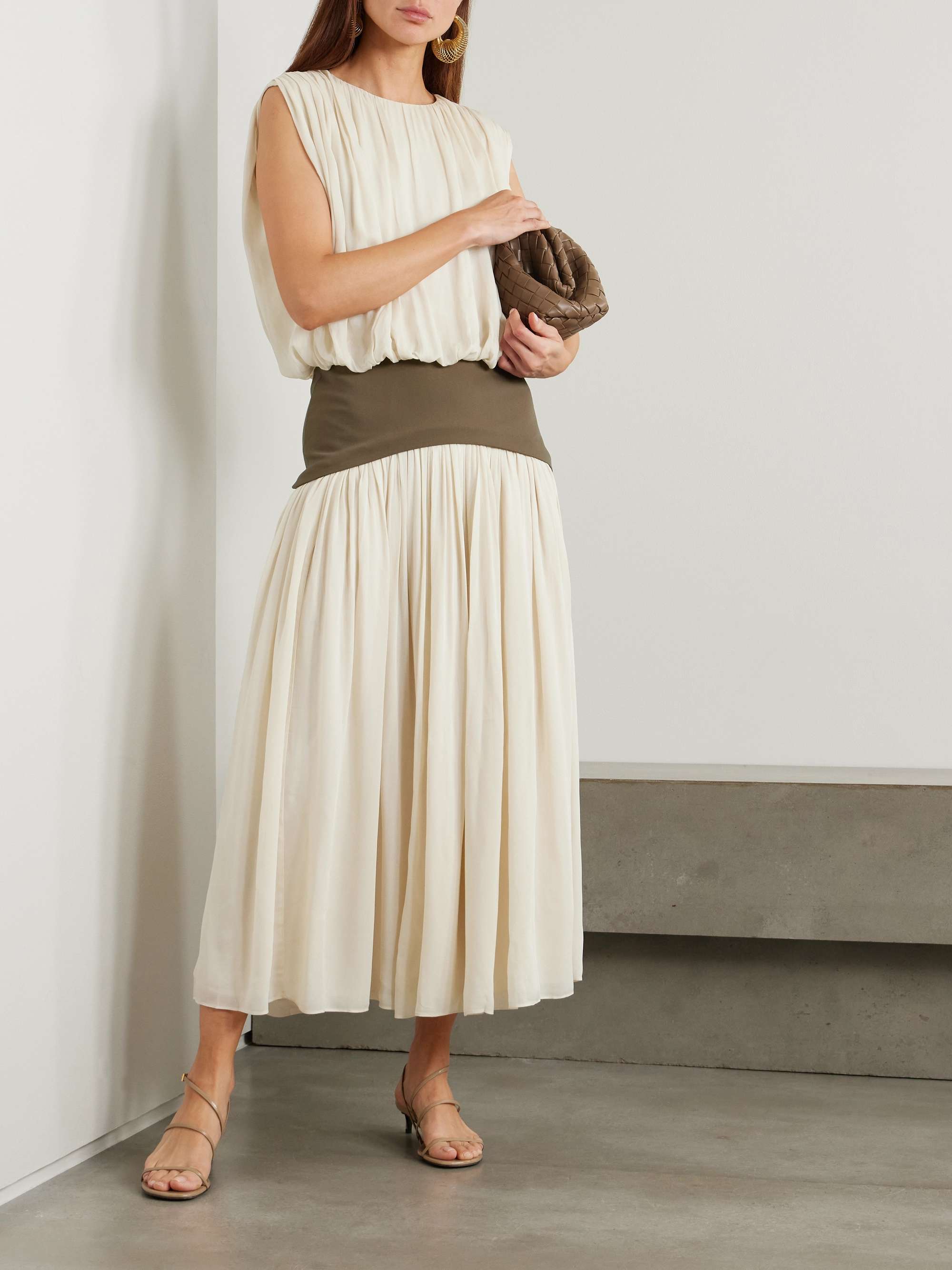 Bubble grain de poudre-trimmed pleated chiffon gown view