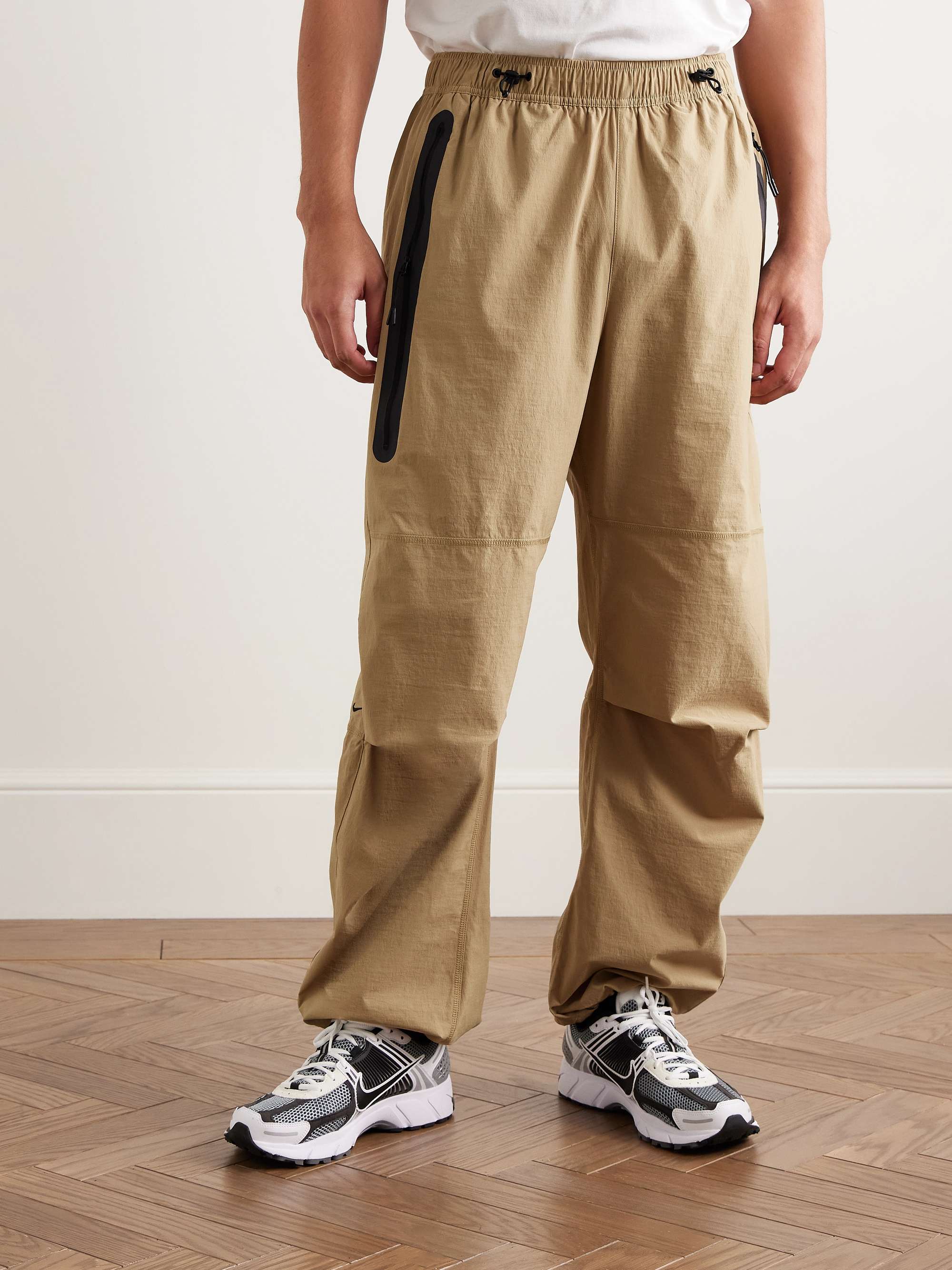 Tech Wide-Leg Pleated Logo-Print Stretch-Nylon Trousers view