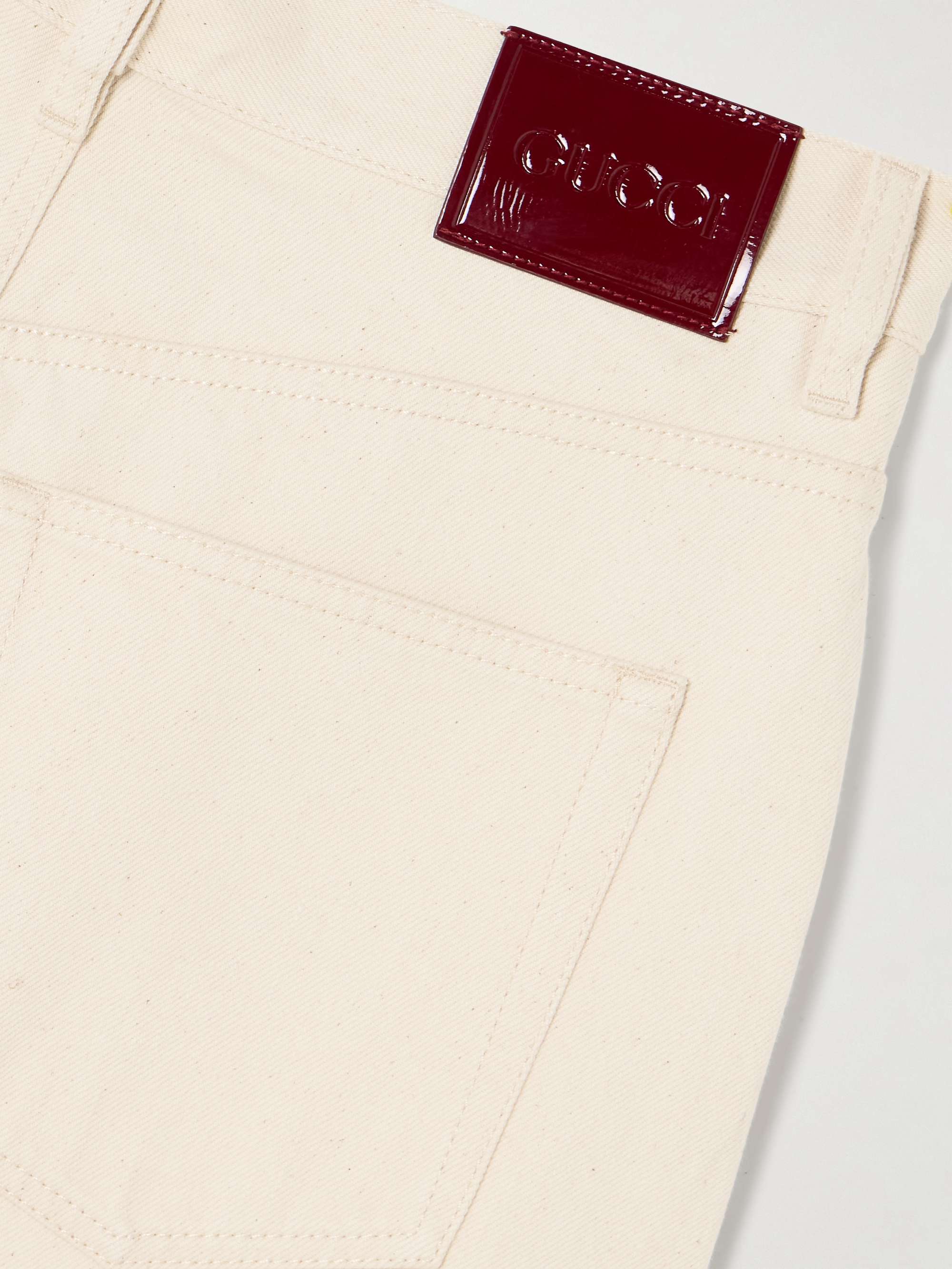 Patent leather-trimmed paneled high-rise barrel-leg jeans view