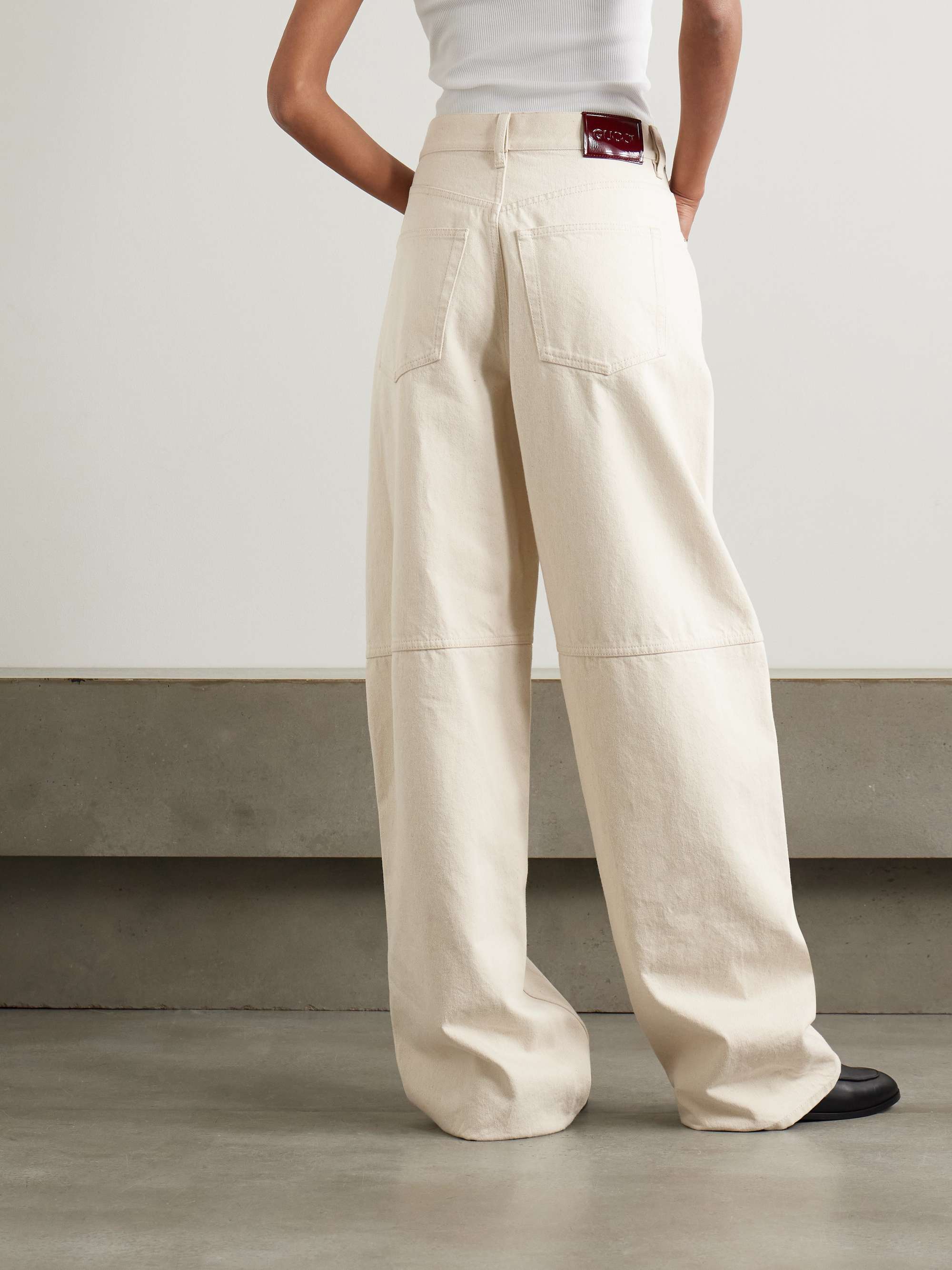 Patent leather-trimmed paneled high-rise barrel-leg jeans view