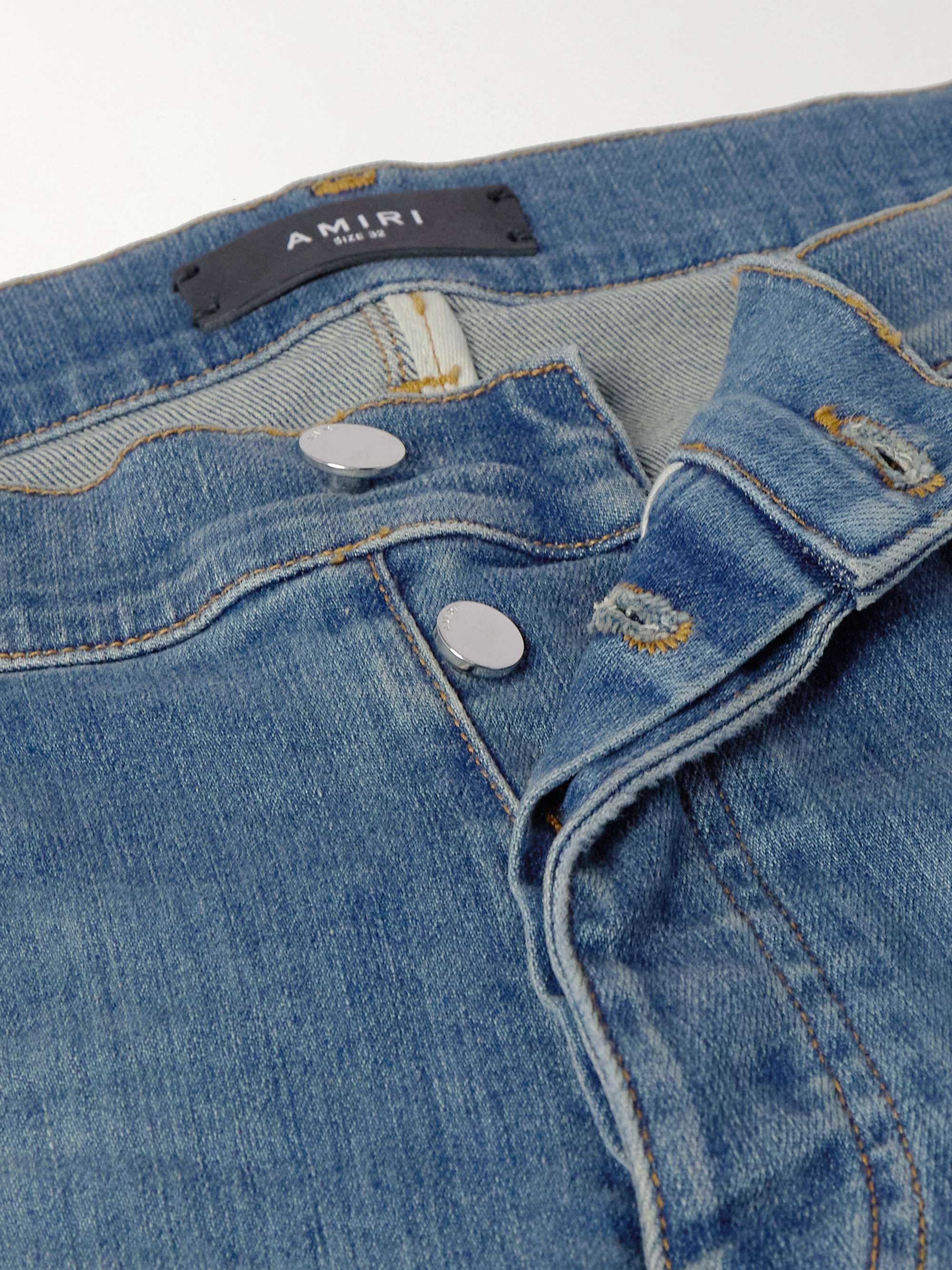 Skinny-Fit Distressed Patchwork Jeans view