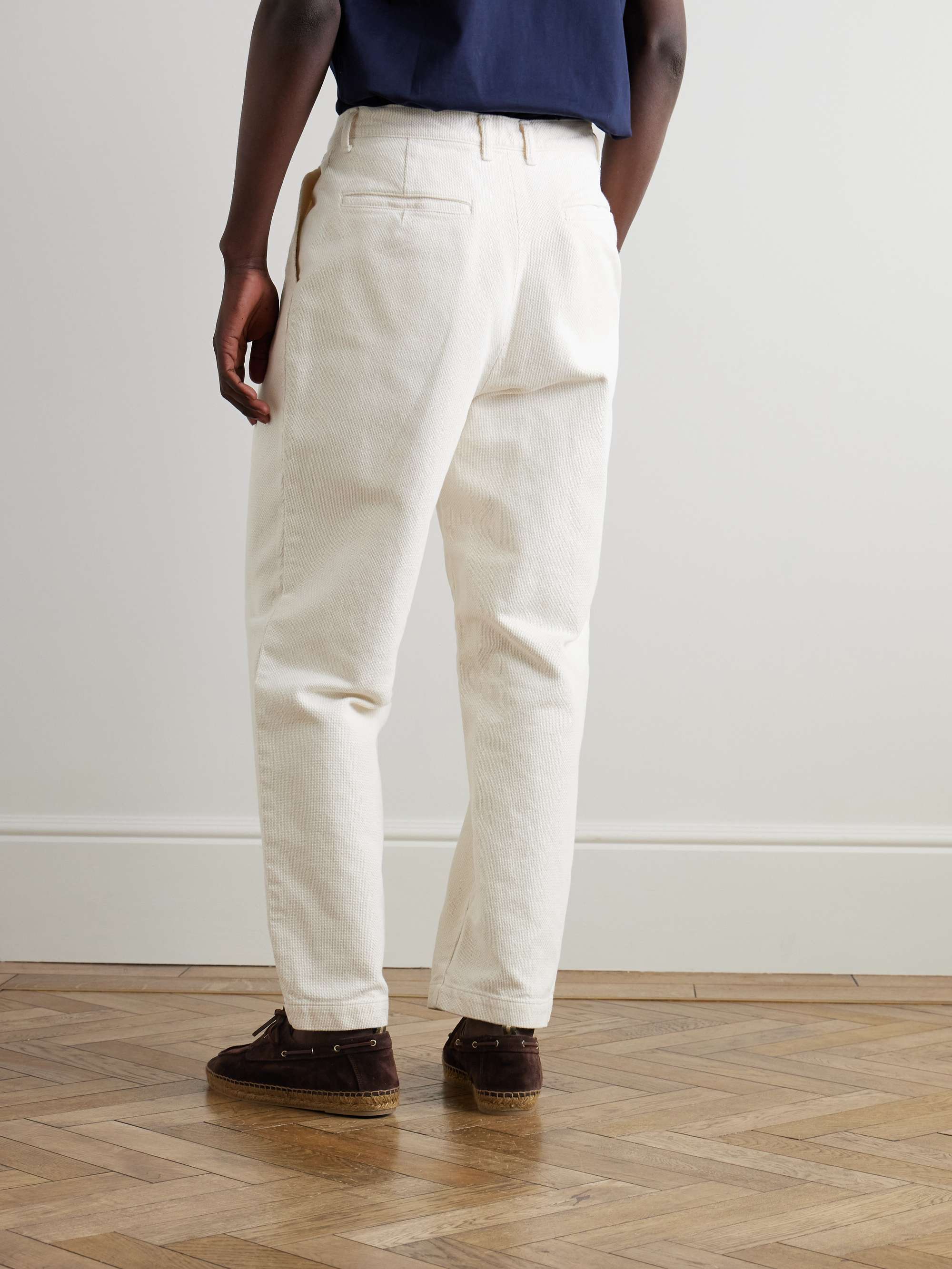 Tapered Pleated Textured-Cotton Trousers view