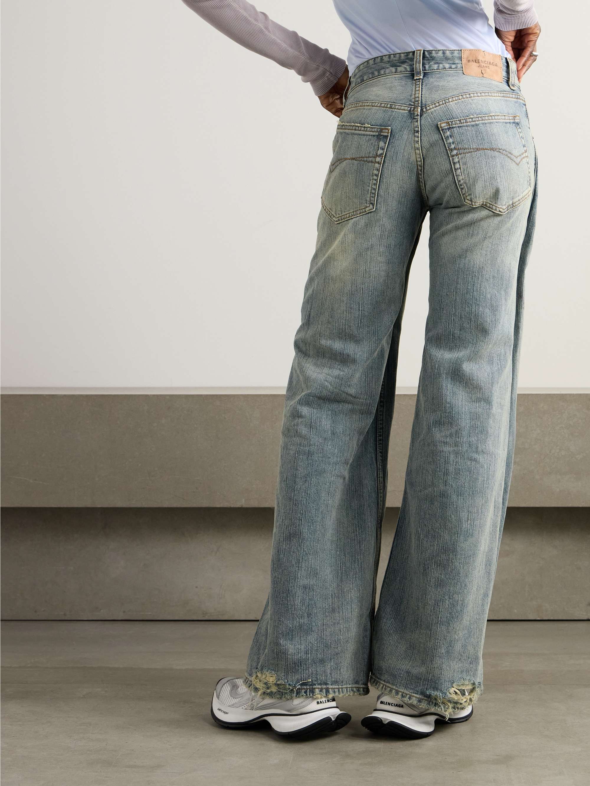 Distressed mid-rise wide-leg jeans view