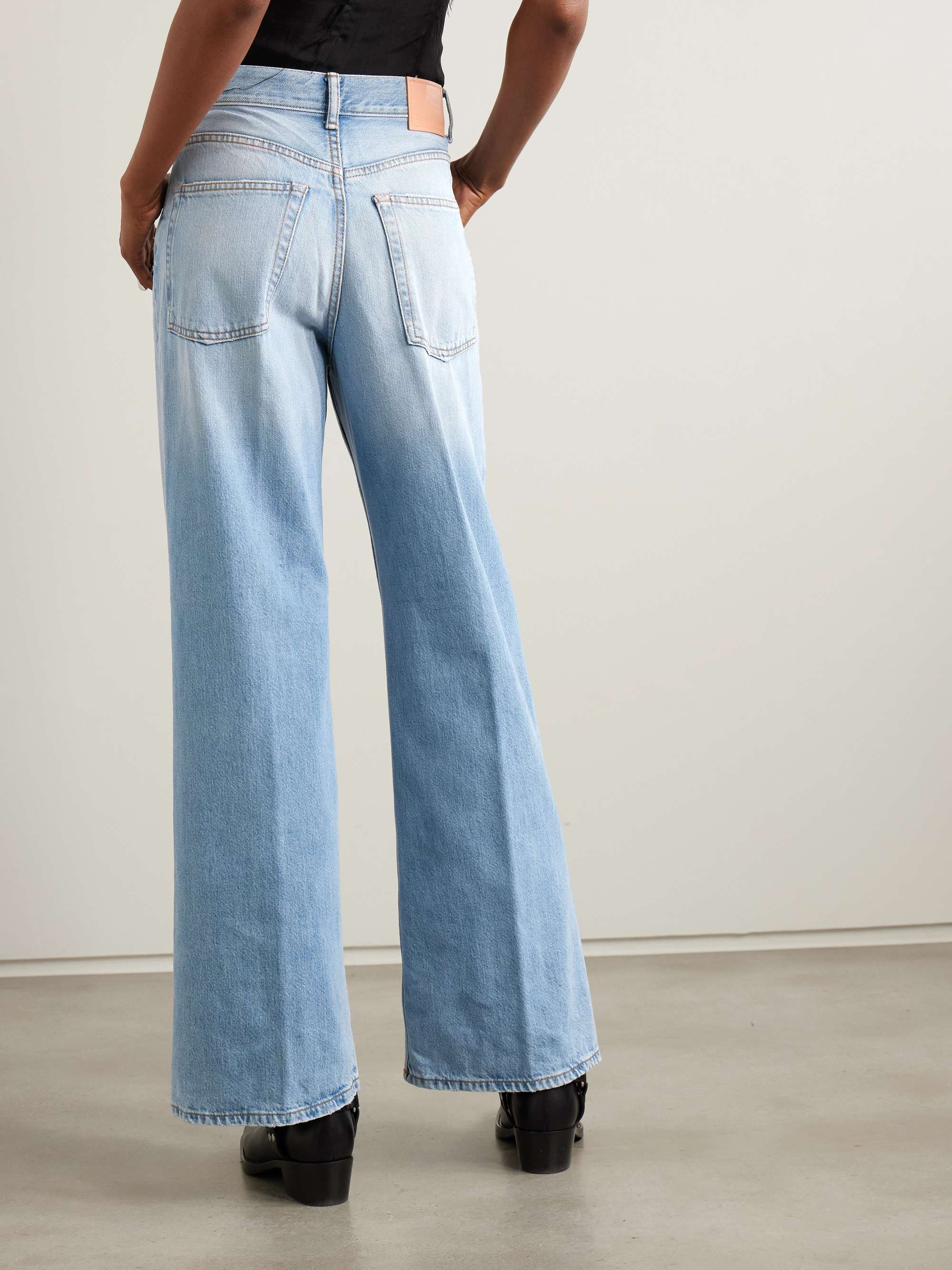 Distressed high-rise wide-leg organic jeans view
