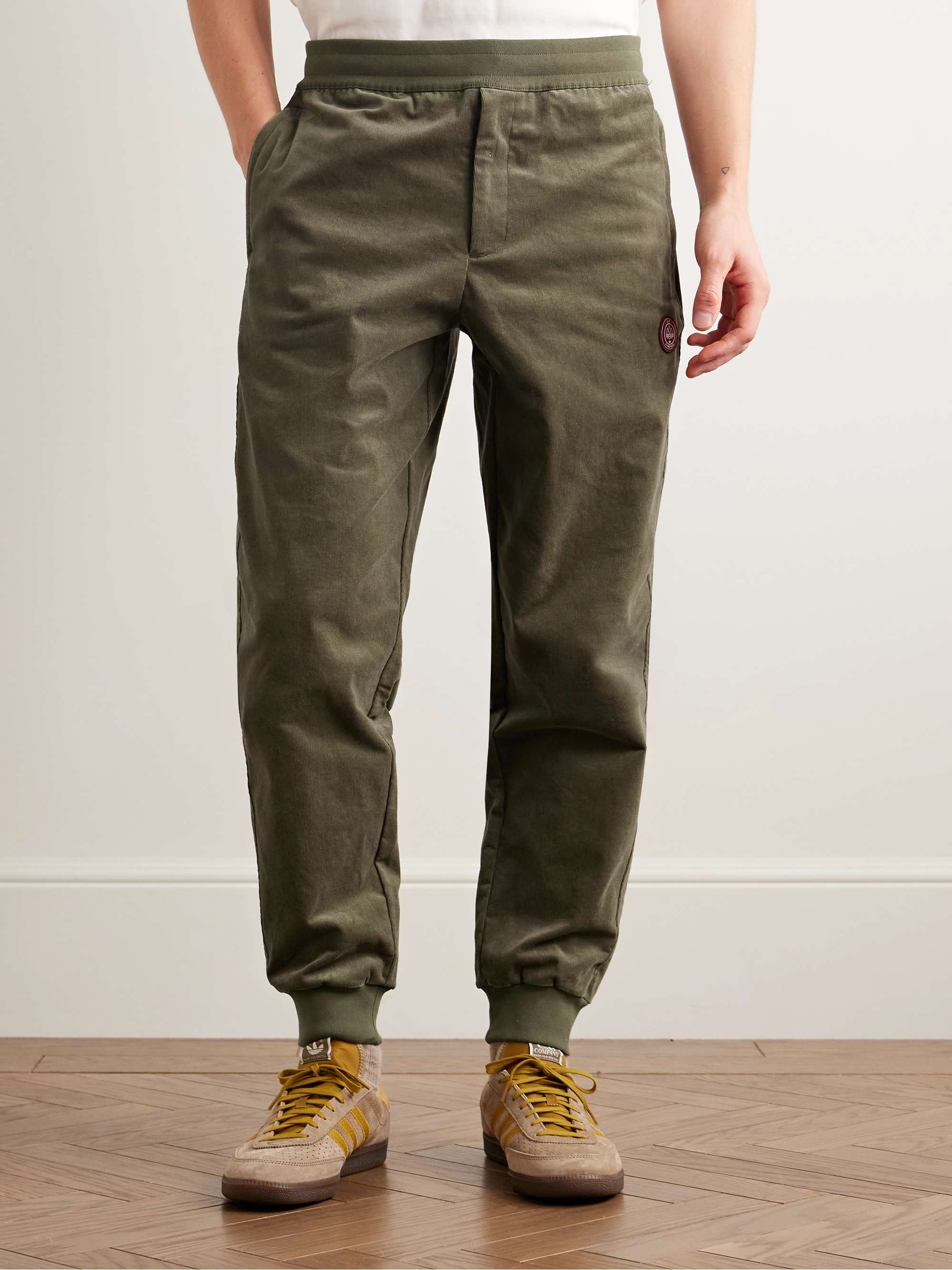 + C.P. Company Spezial Settend Tapered Logo-Appliquéd Cotton-Blend Corduroy Track Pants view