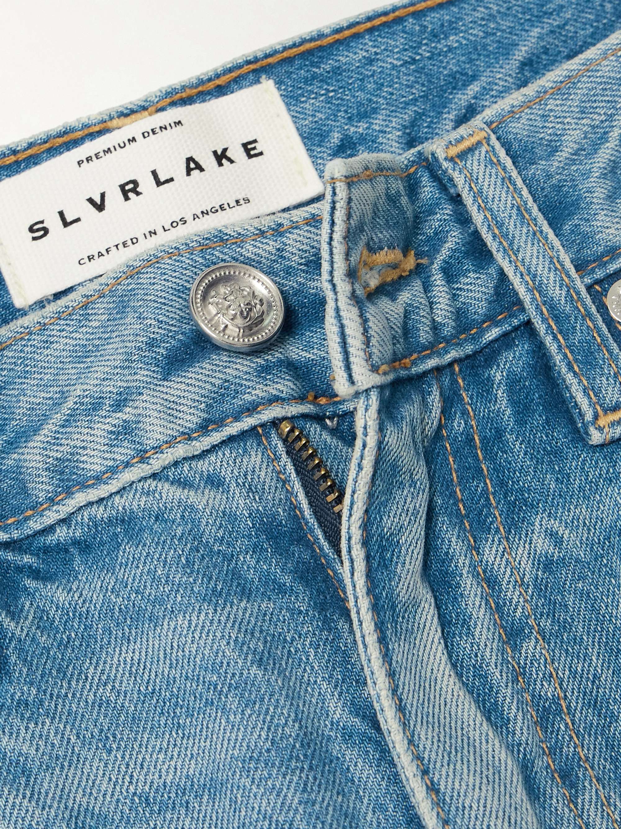 Virginia distressed high-rise slim-leg jeans view