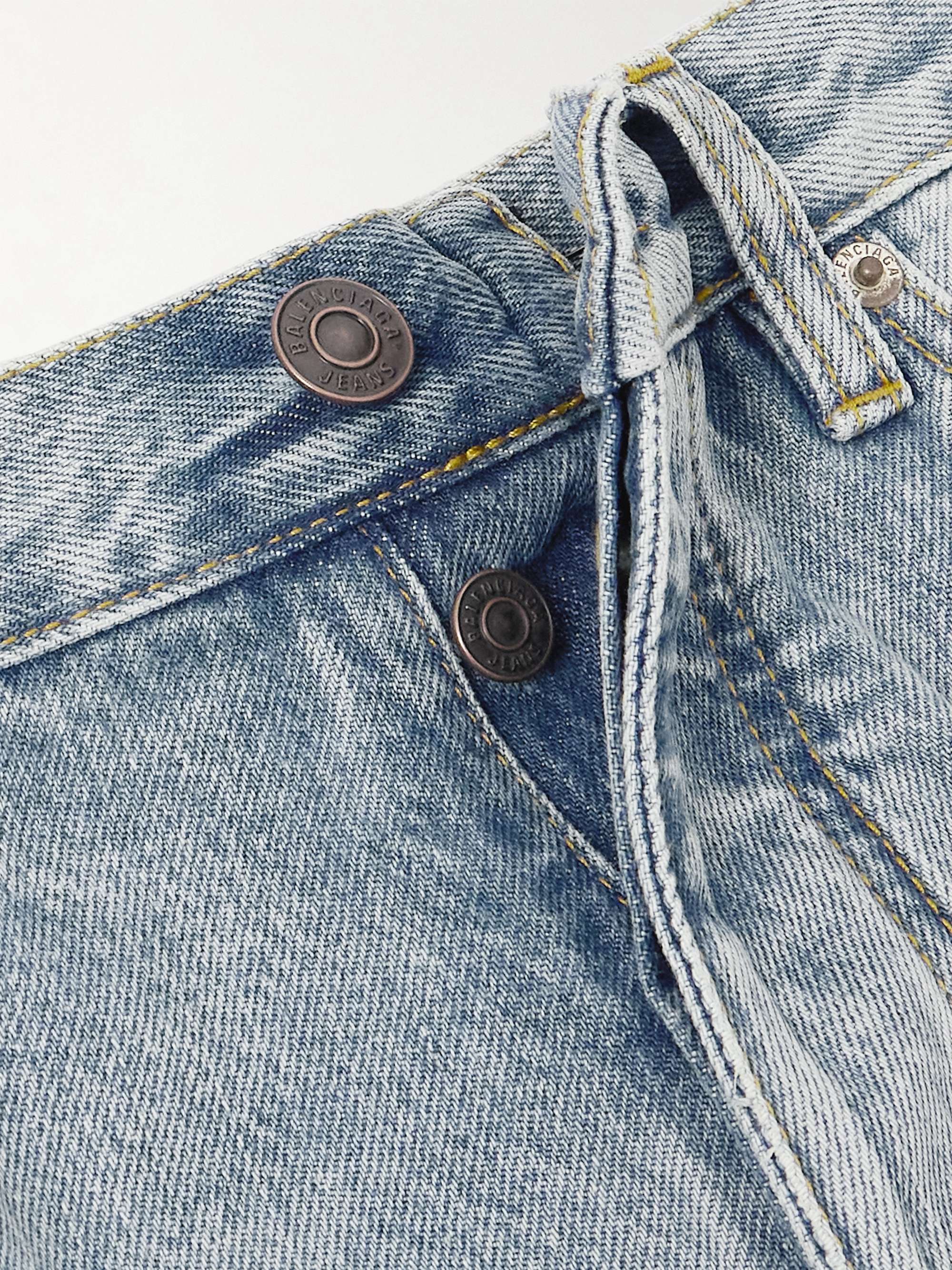 Distressed mid-rise straight-leg jeans view