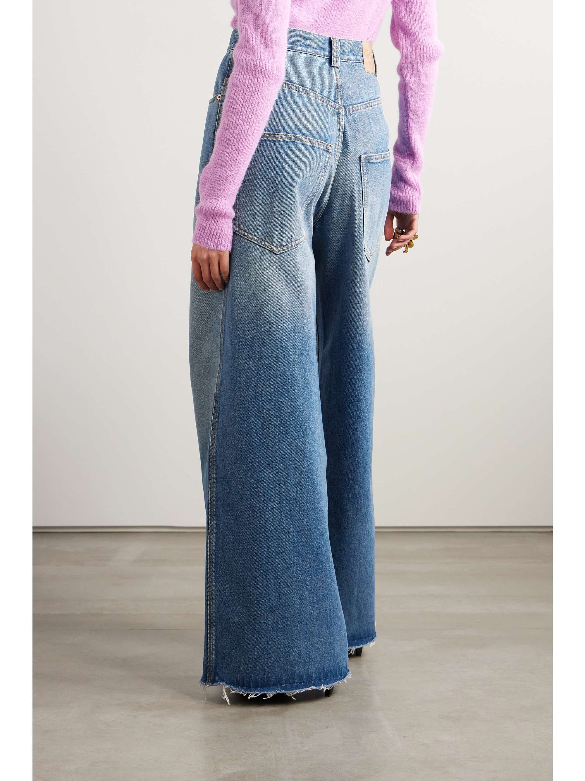 Horsebit-detailed frayed high-rise wide-leg jeans view