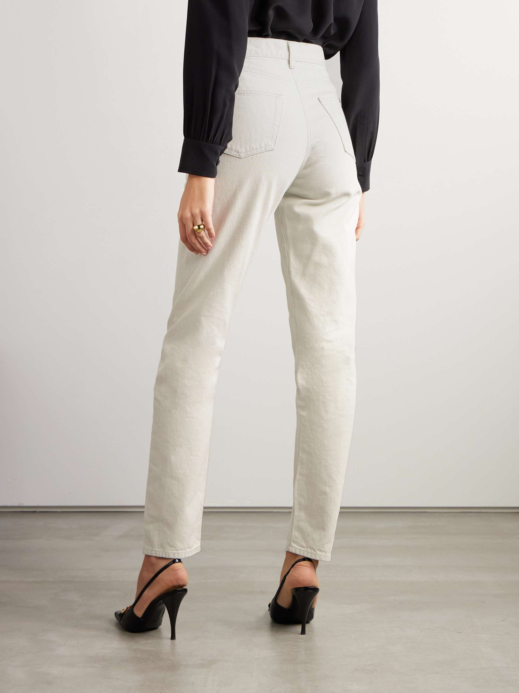 High-rise slim-leg jeans view