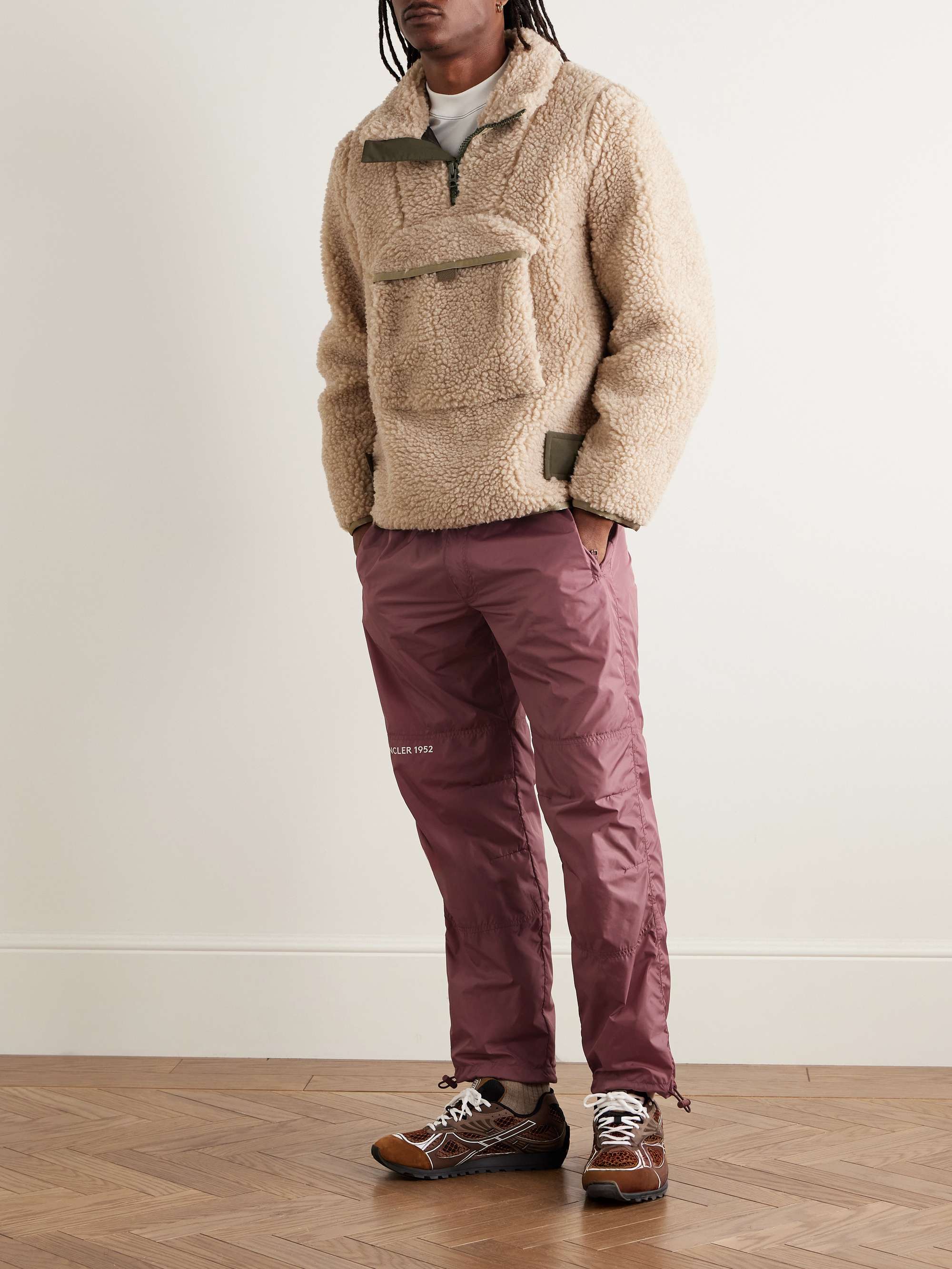 2 Moncler 1952 Tapered Logo-Print Shell Trousers view