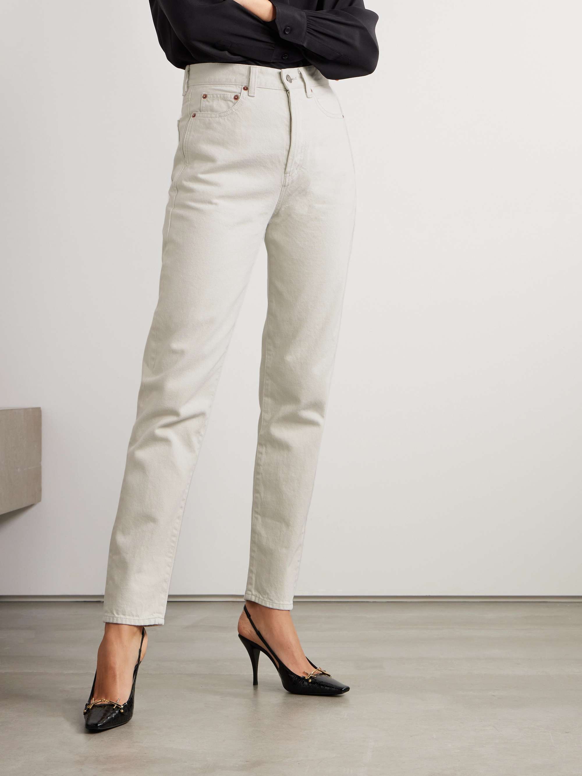 High-rise slim-leg jeans view
