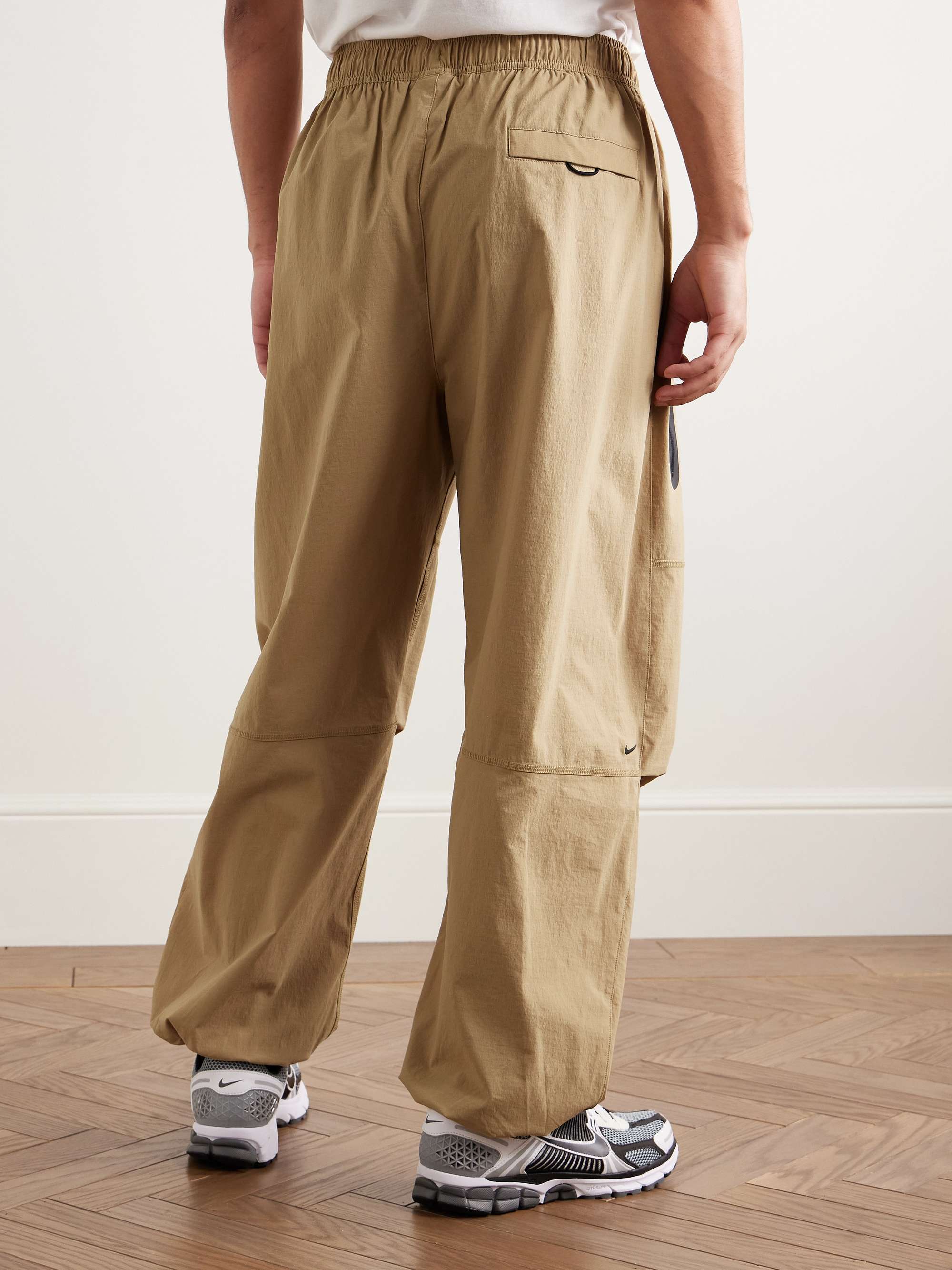 Tech Wide-Leg Pleated Logo-Print Stretch-Nylon Trousers view
