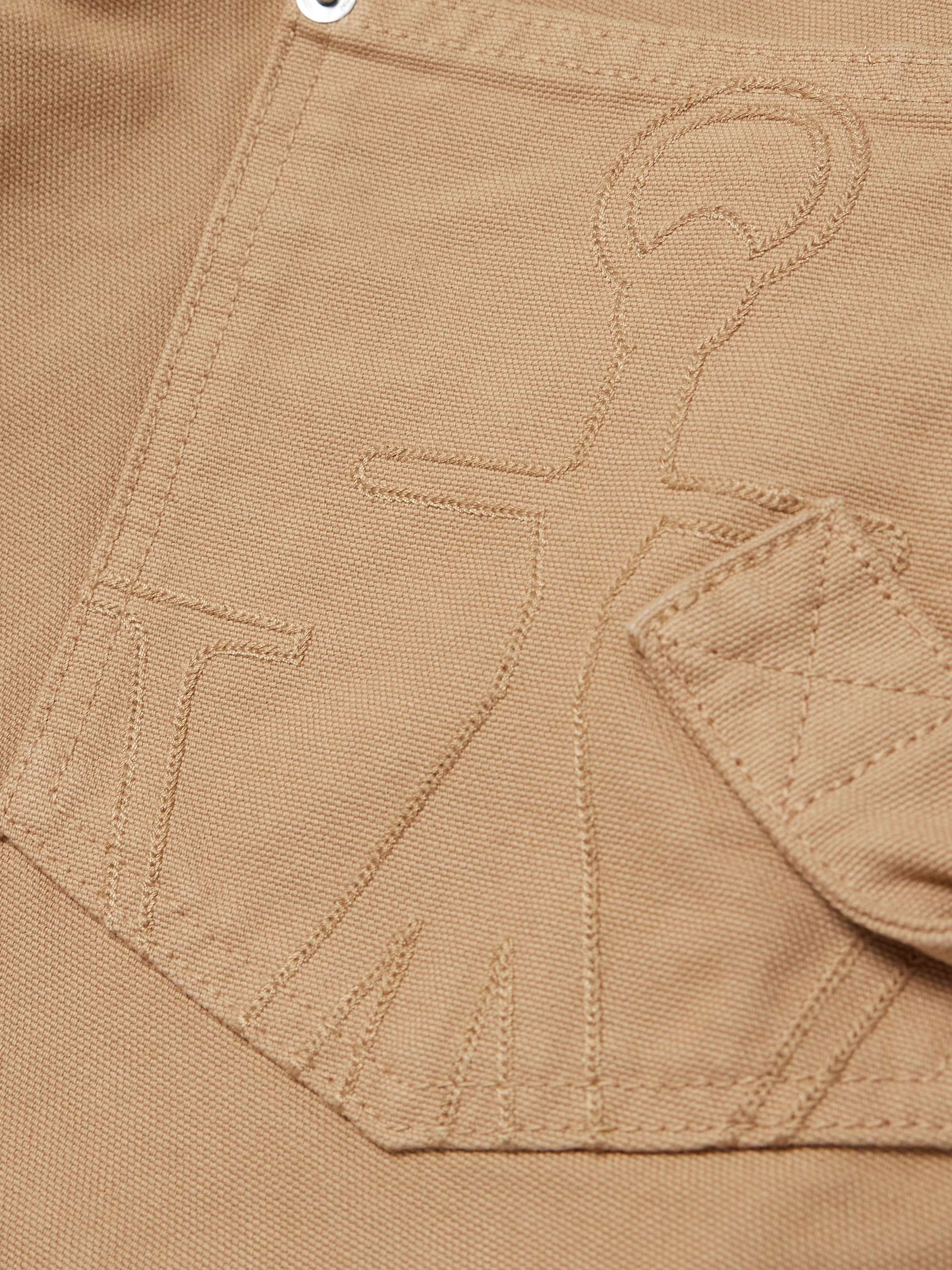 Twisted asymmetric embroidered cotton-canvas pants view