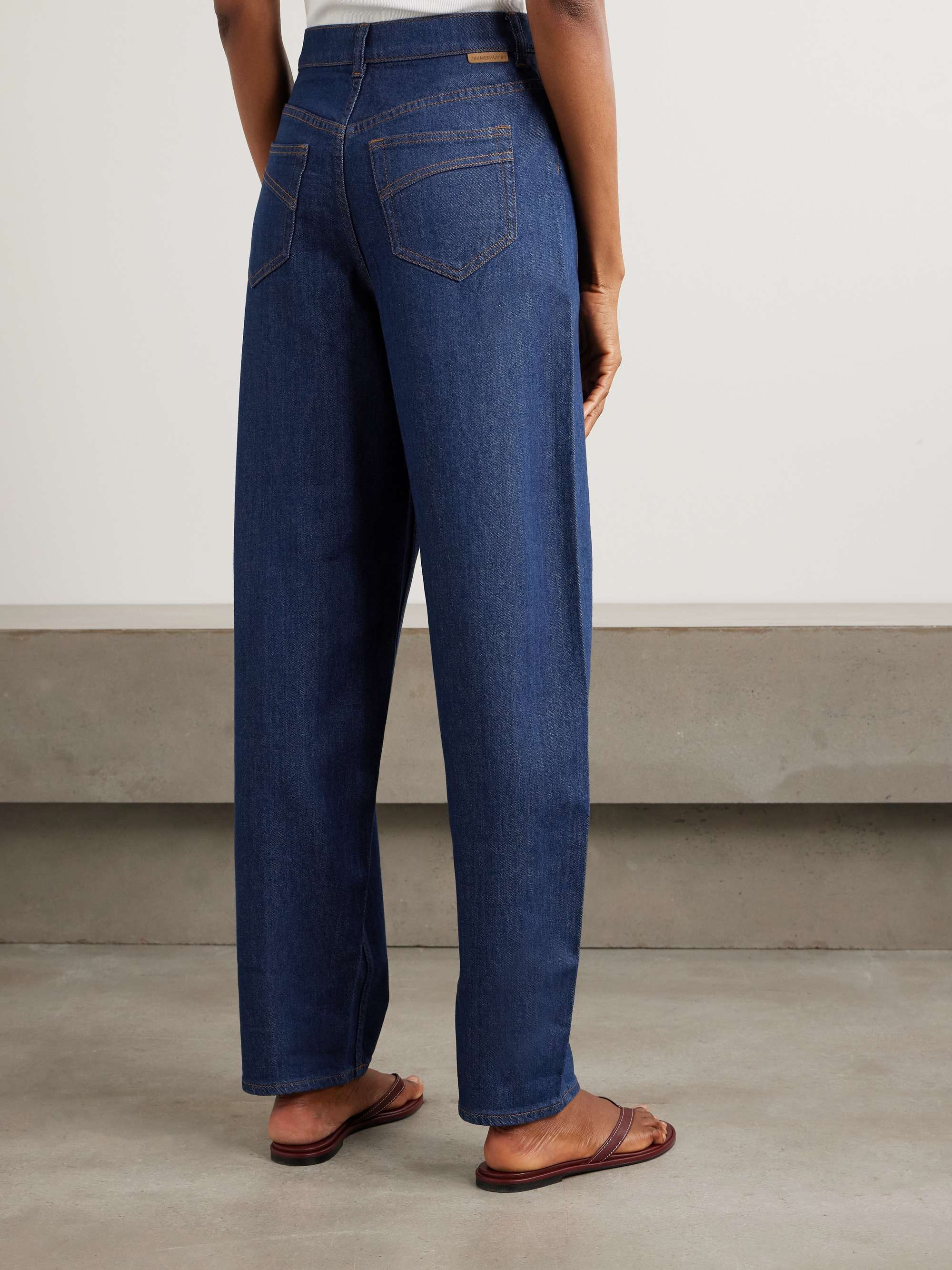 Illuminate belted high-rise barrel-leg jeans view