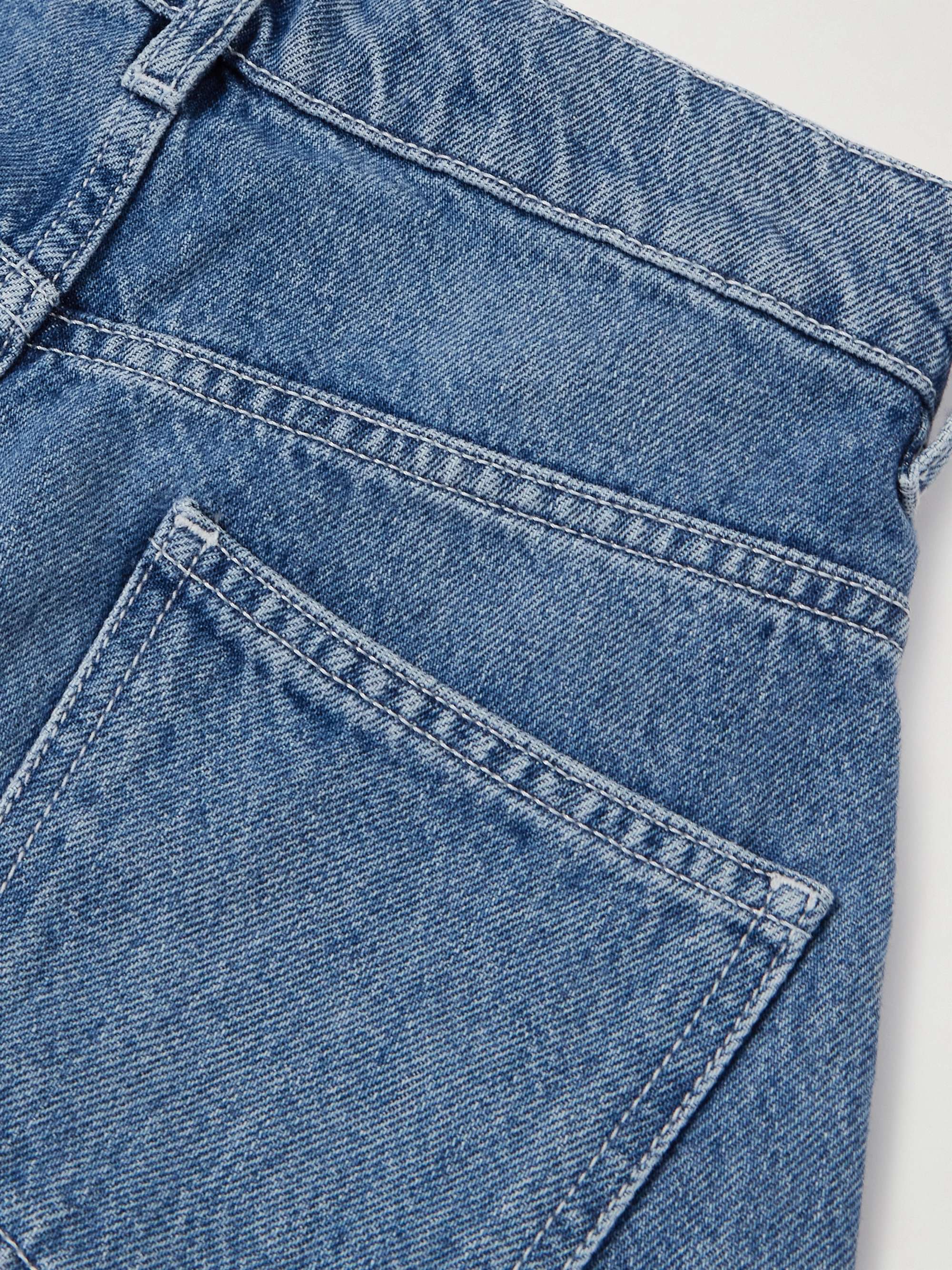 Twisted asymmetric embroidered high-rise jeans view