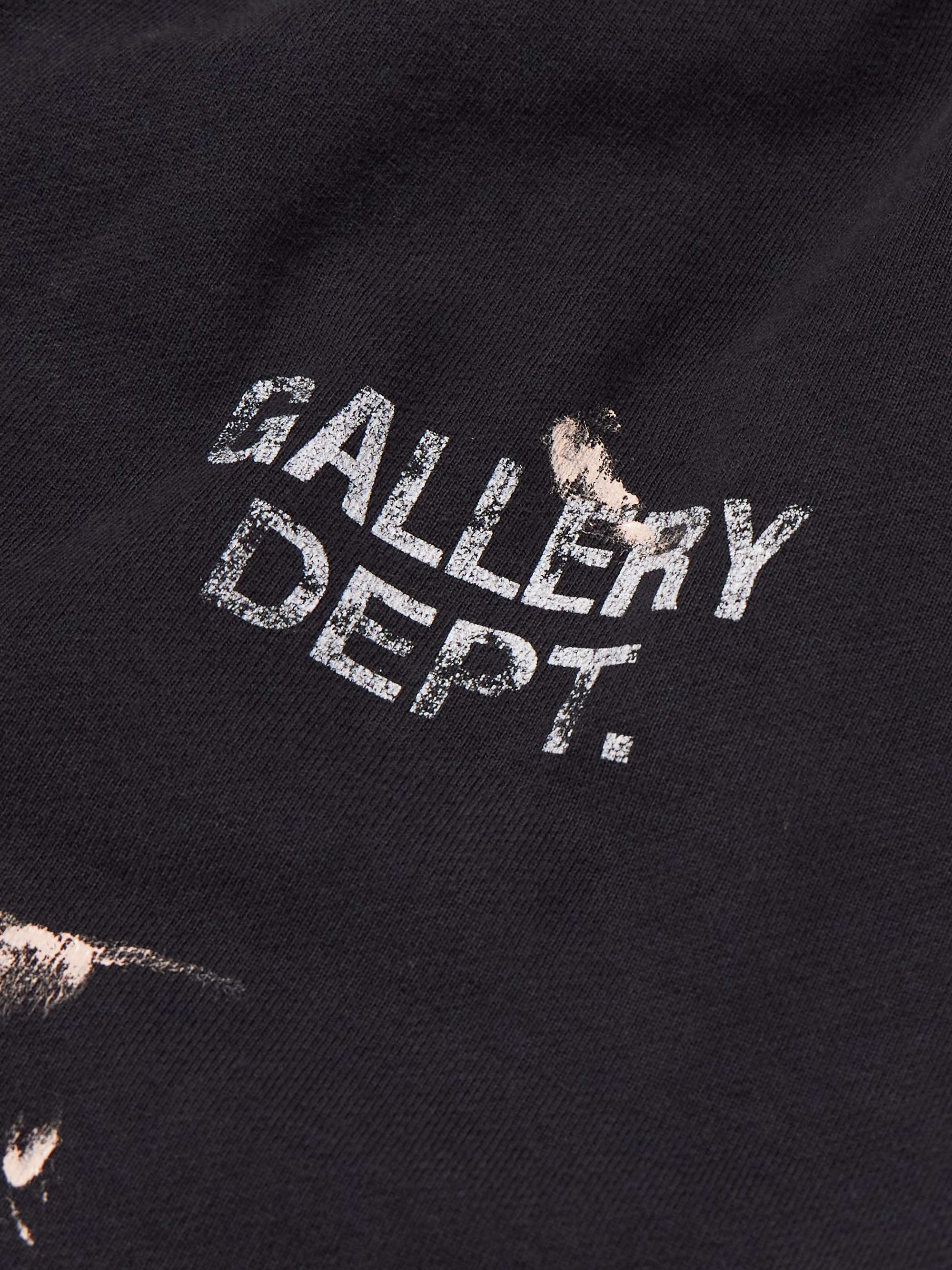 Flared Paint-Splattered Panelled Logo-Print Cotton-Jersey Sweatpants view