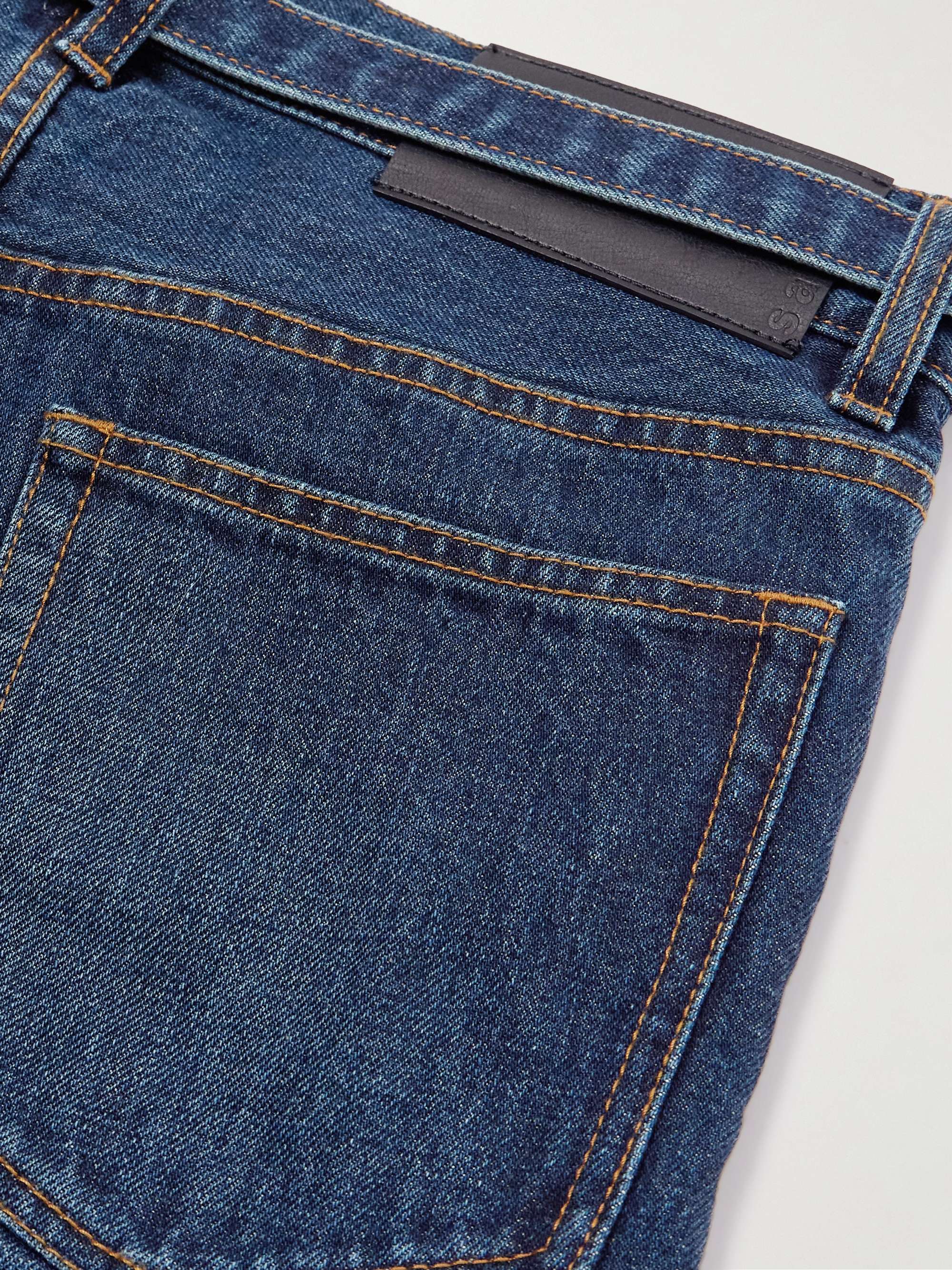 Belted bootcut jeans view