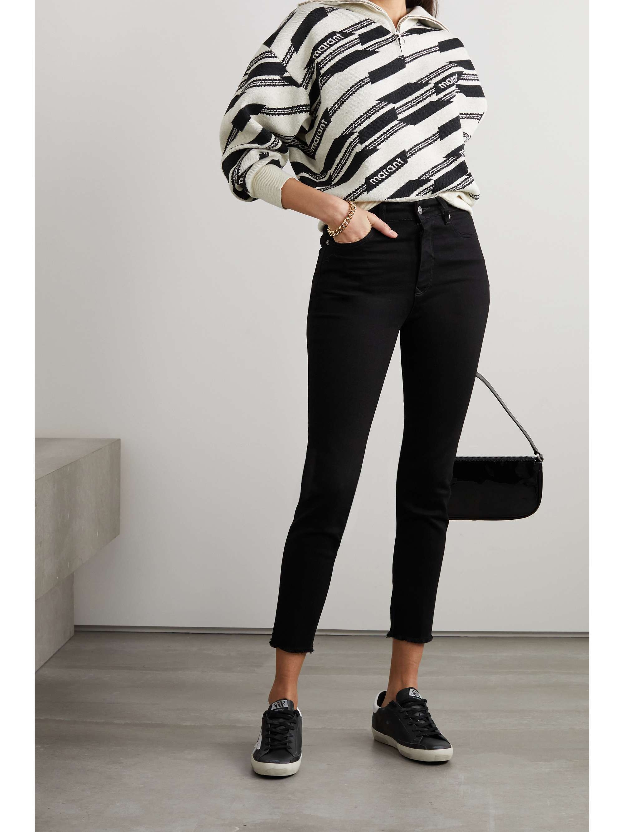 Frayed high-rise skinny jeans view