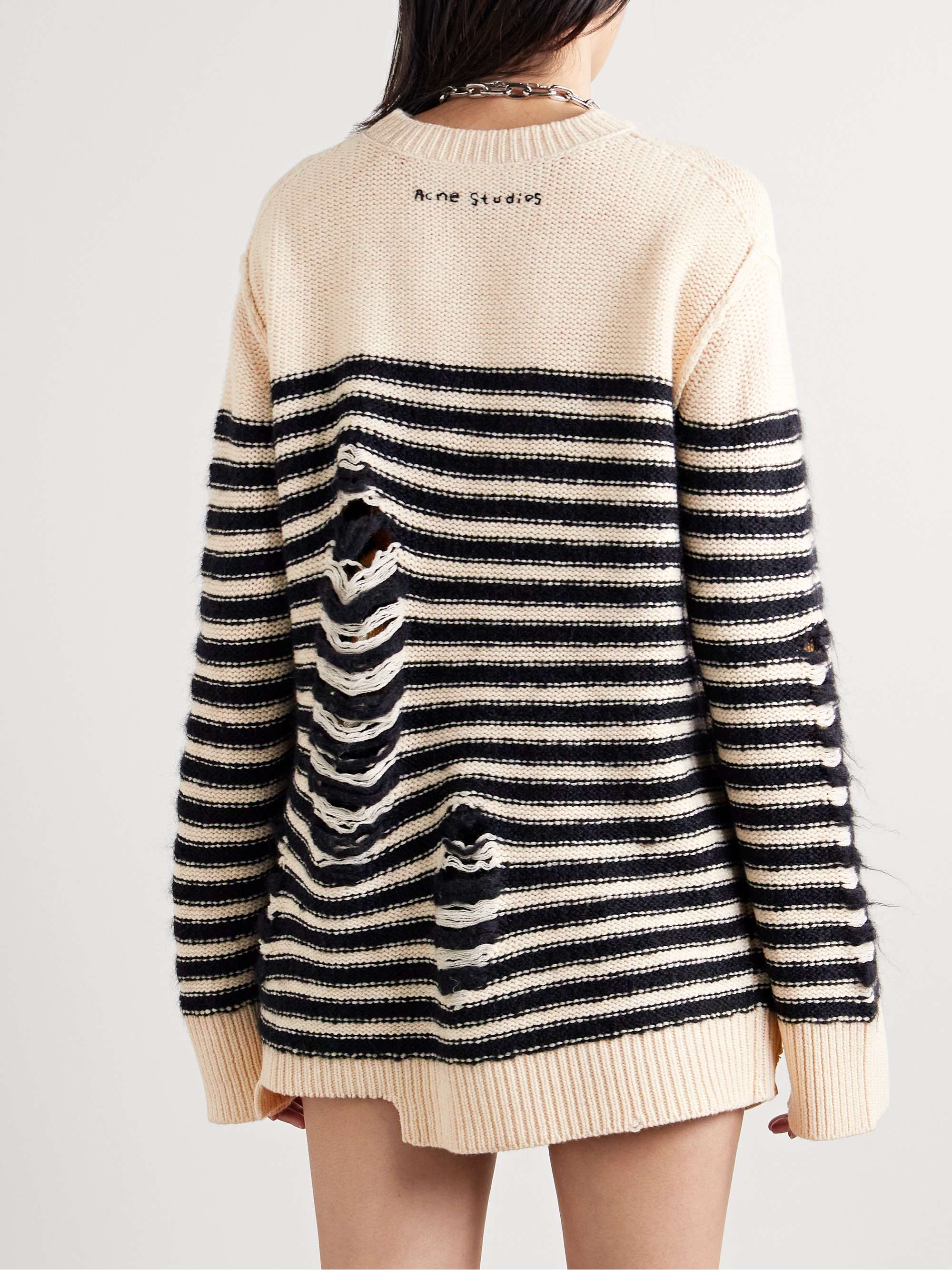Distressed striped wool-blend sweater view