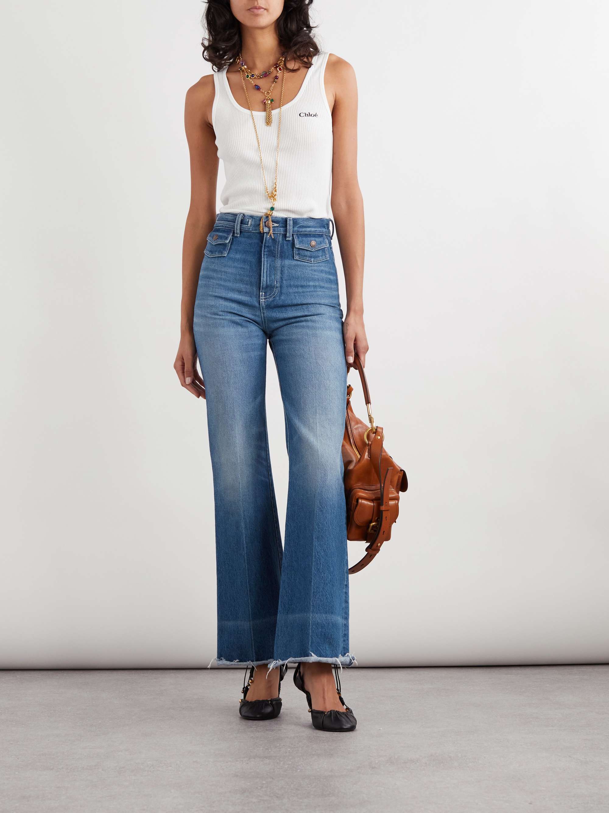 Frayed high-rise flared jeans view