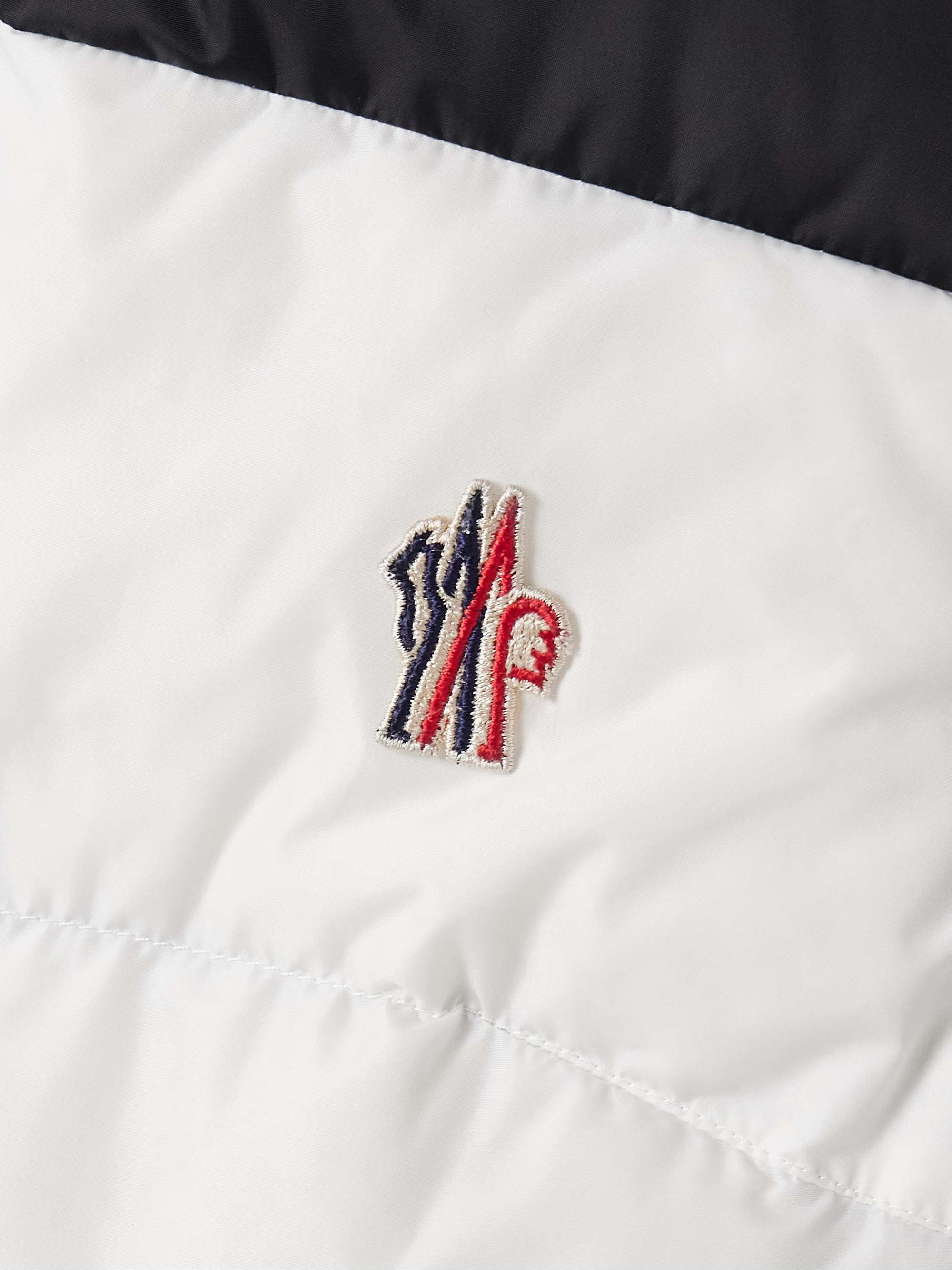 Belted paneled quilted down ski suit view