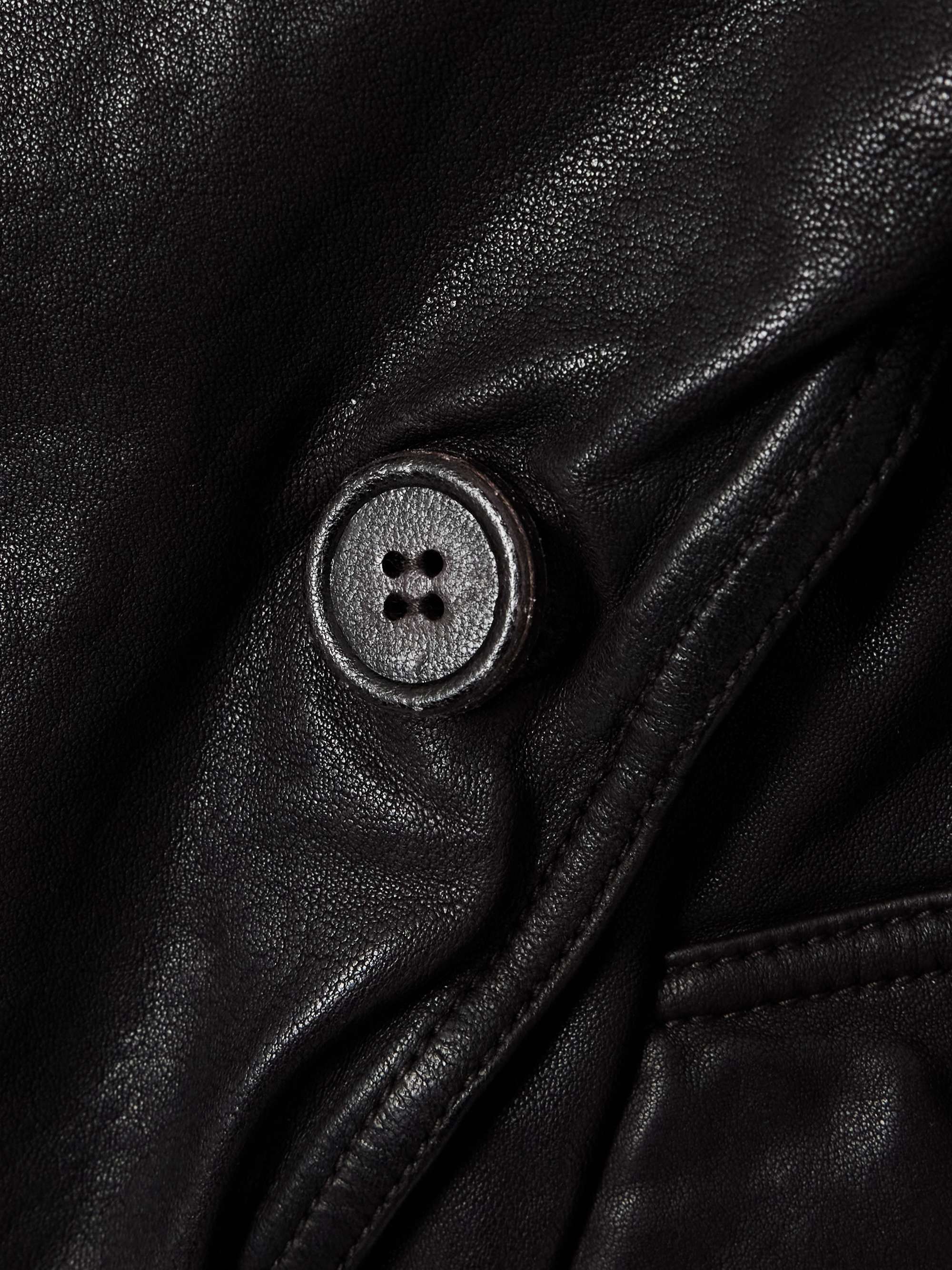 Double-breasted belted leather jacket view