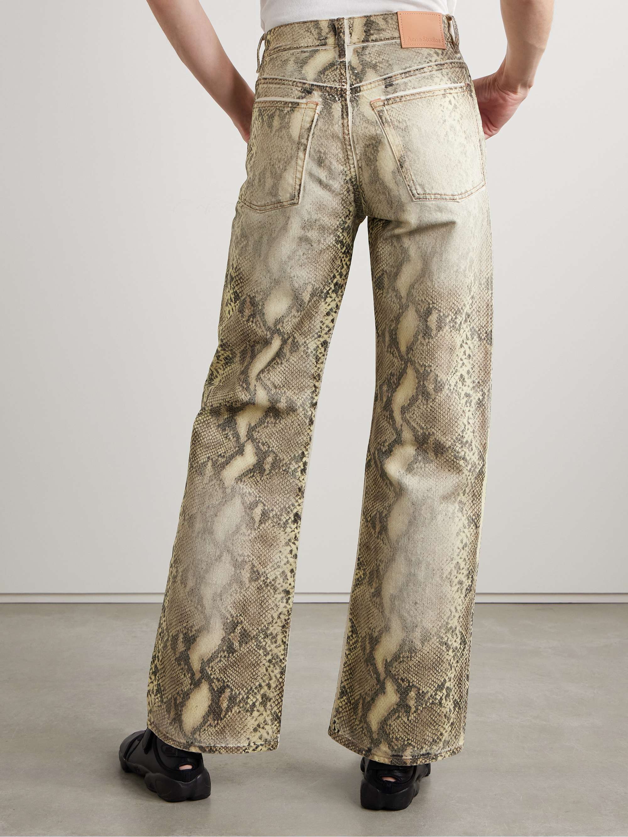 Snake-print coated mid-rise jeans view