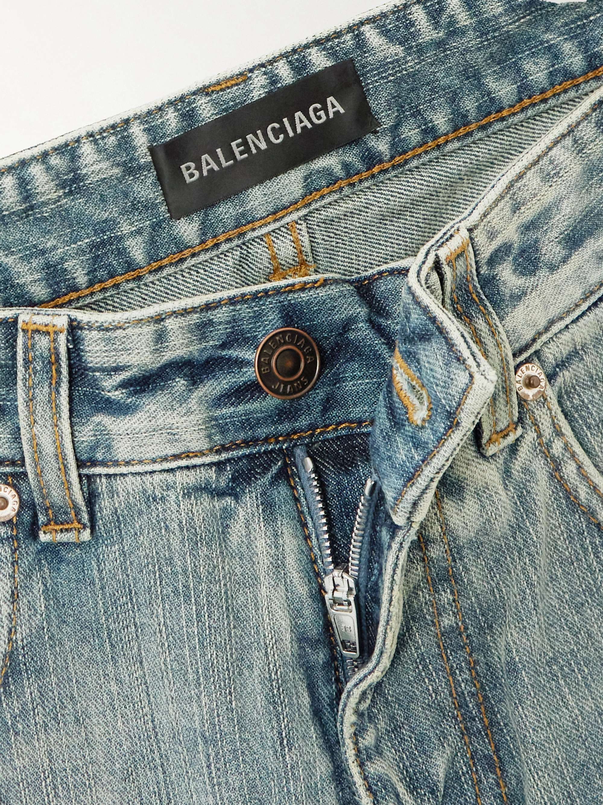 Distressed mid-rise wide-leg jeans view