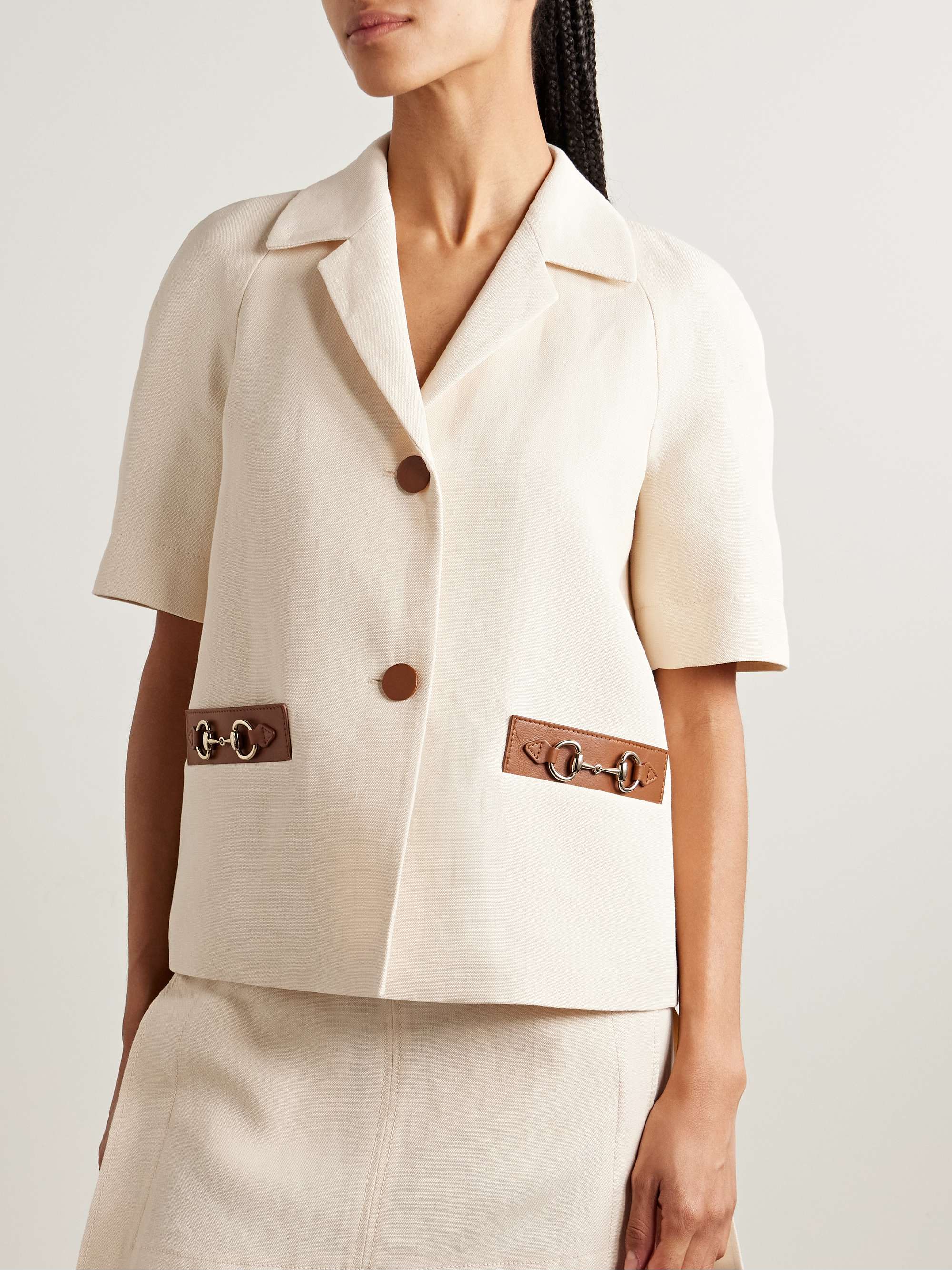 Horsebit-detailed leather-trimmed linen-canvas jacket view