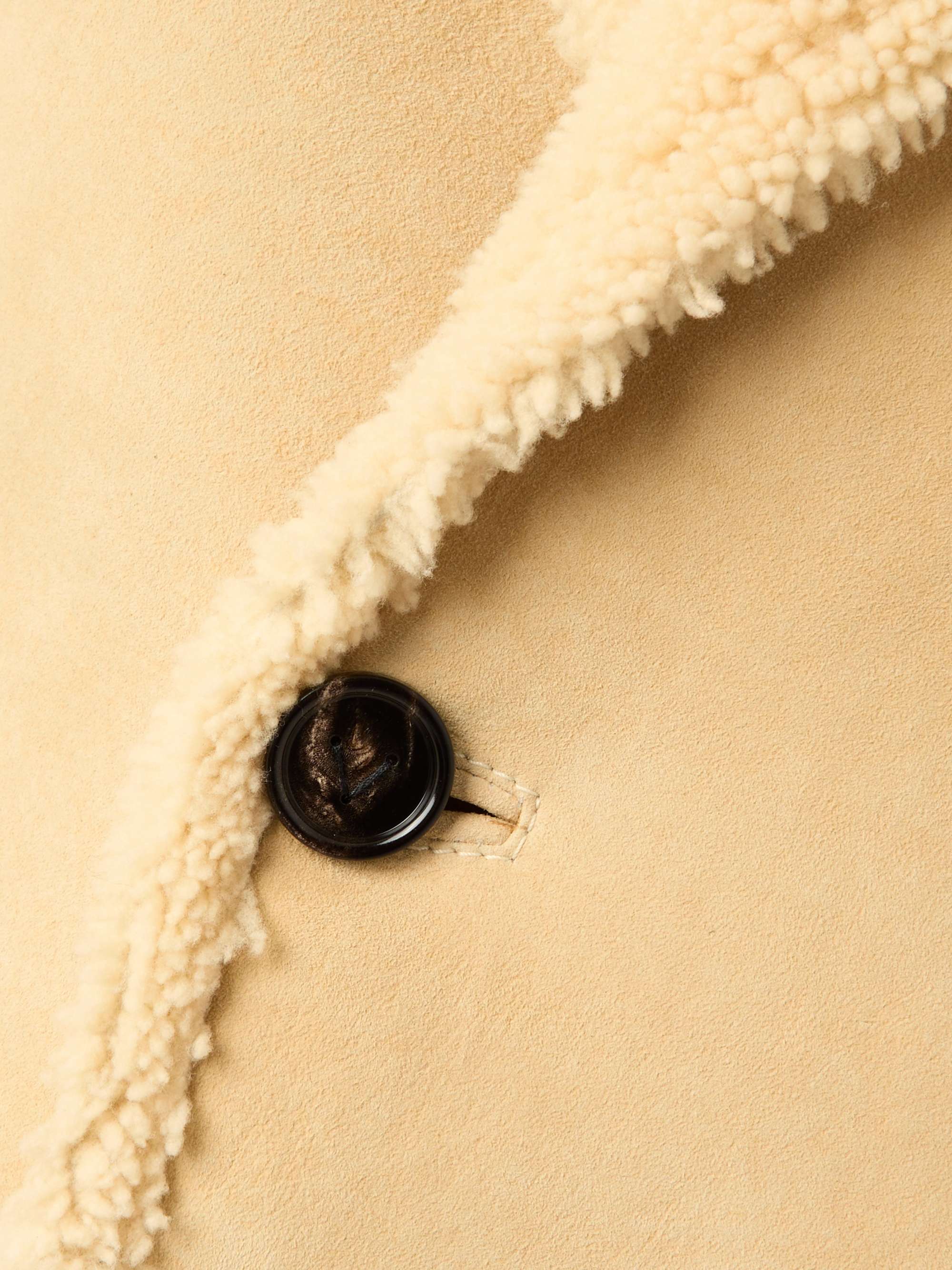 Double-breasted shearling coat view