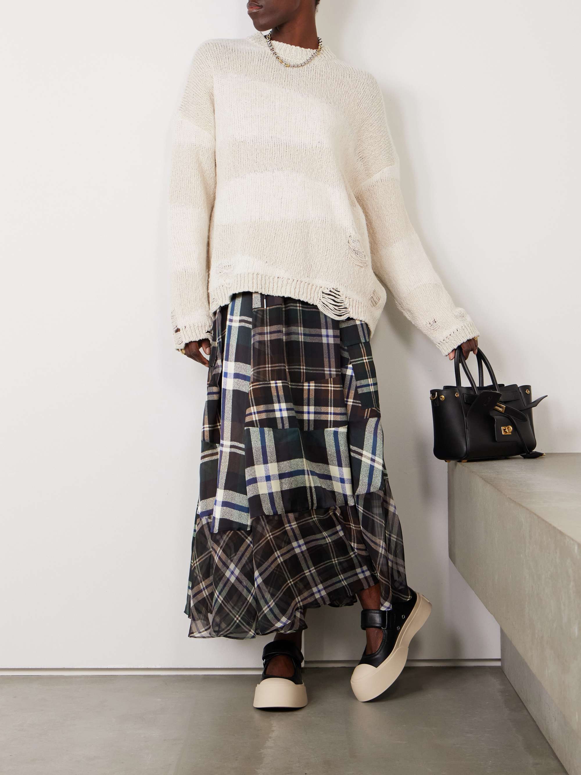 Popover distressed striped cotton and linen-blend sweater view