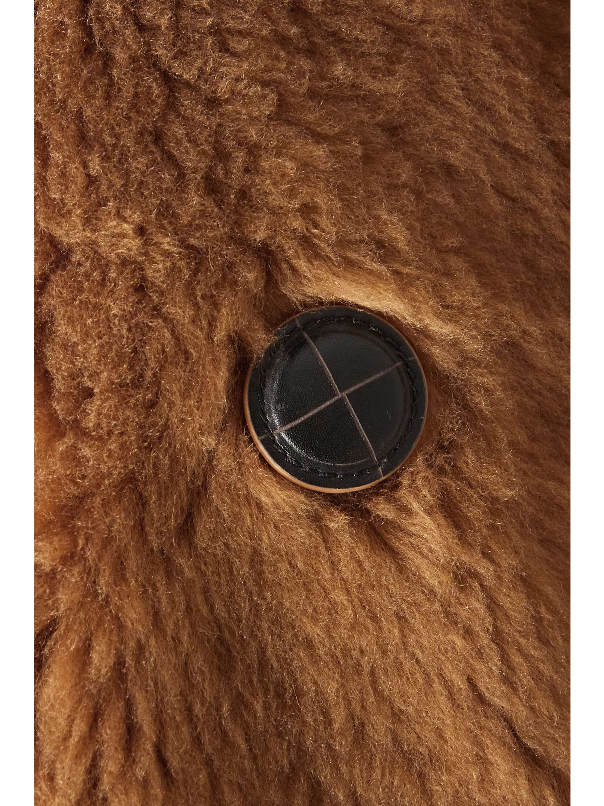 Double-breasted reversible shearling and leather coat view