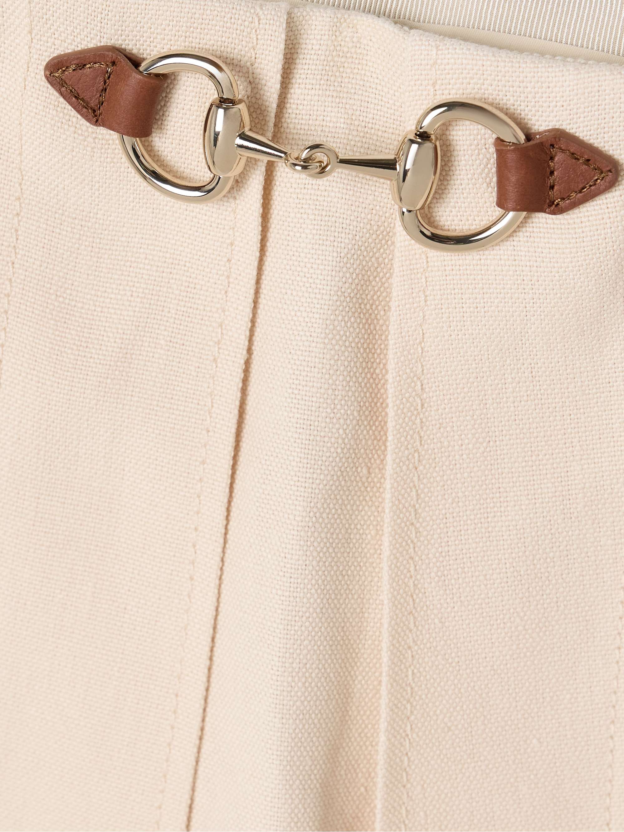 Wrap-effect horsebit-detailed leather-trimmed linen mini skirt view