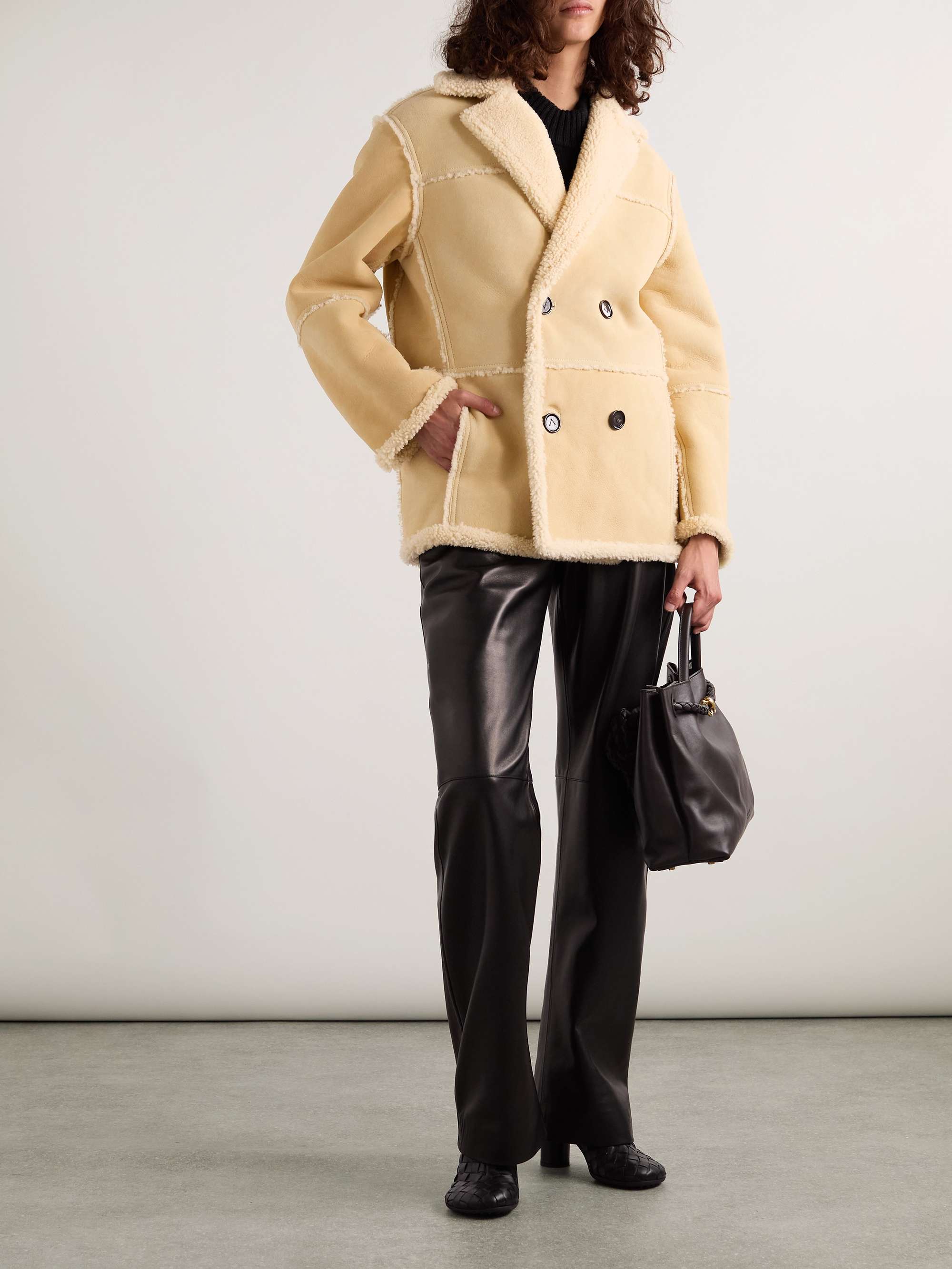 Double-breasted shearling coat view