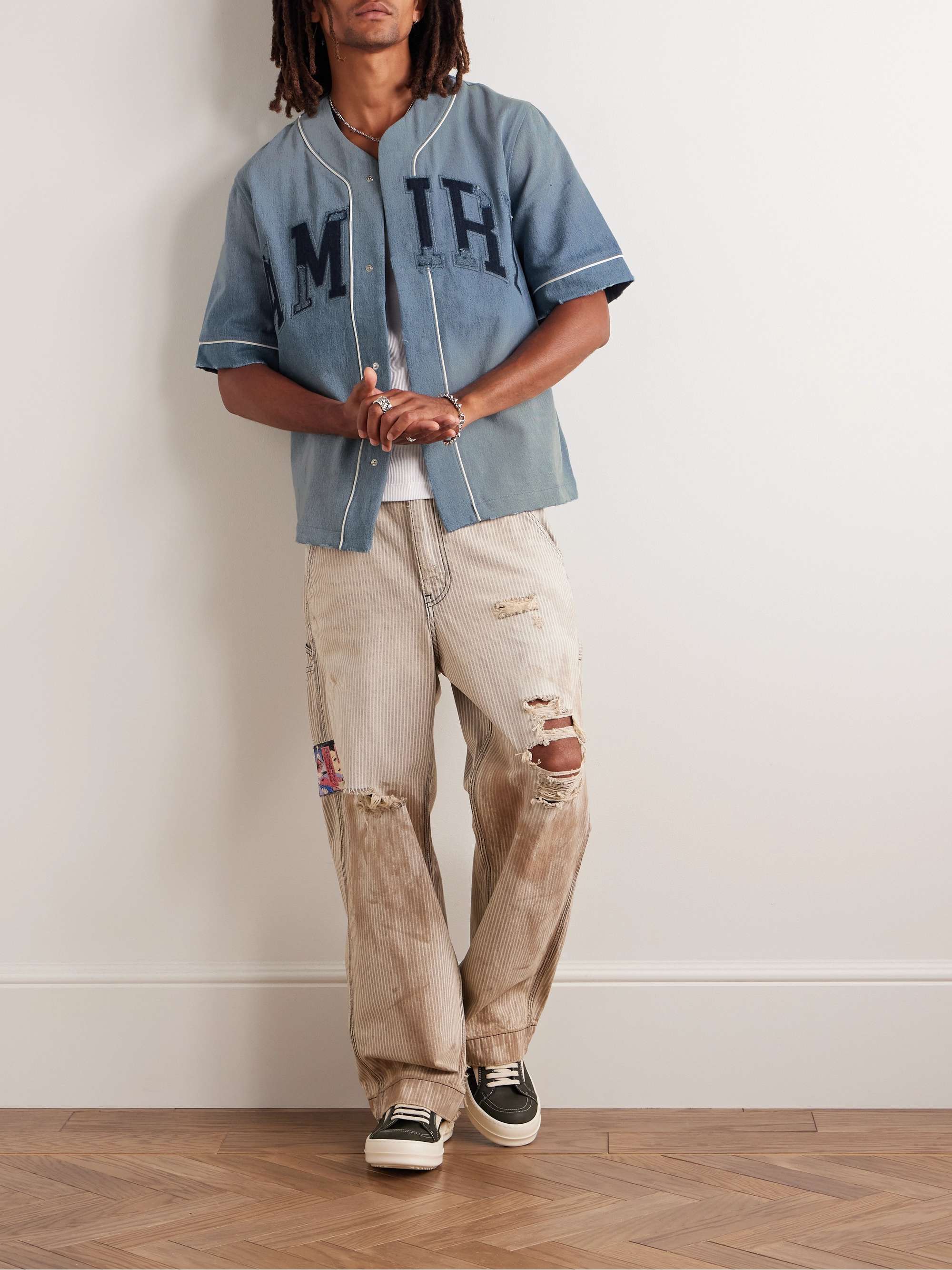 Logo-Appliquéd Distressed Denim Shirt view