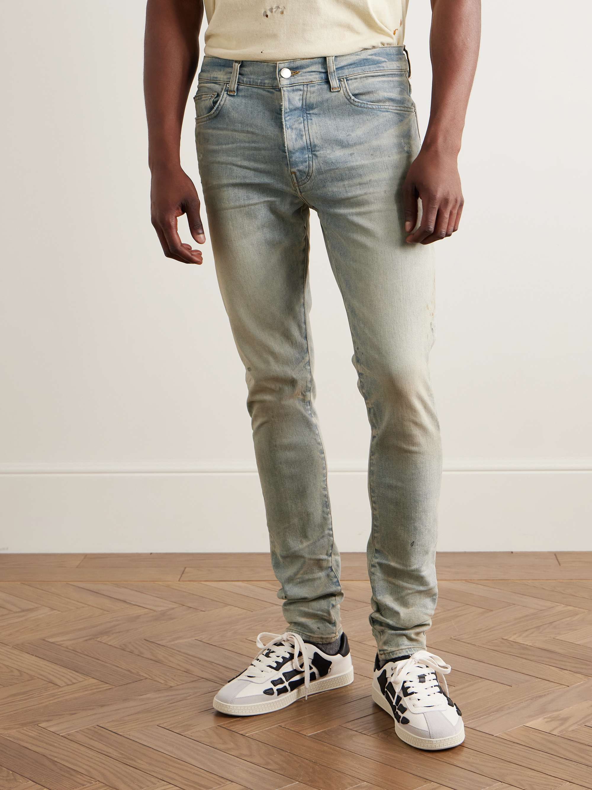 Stack Skinny-Fit Distressed Jeans view