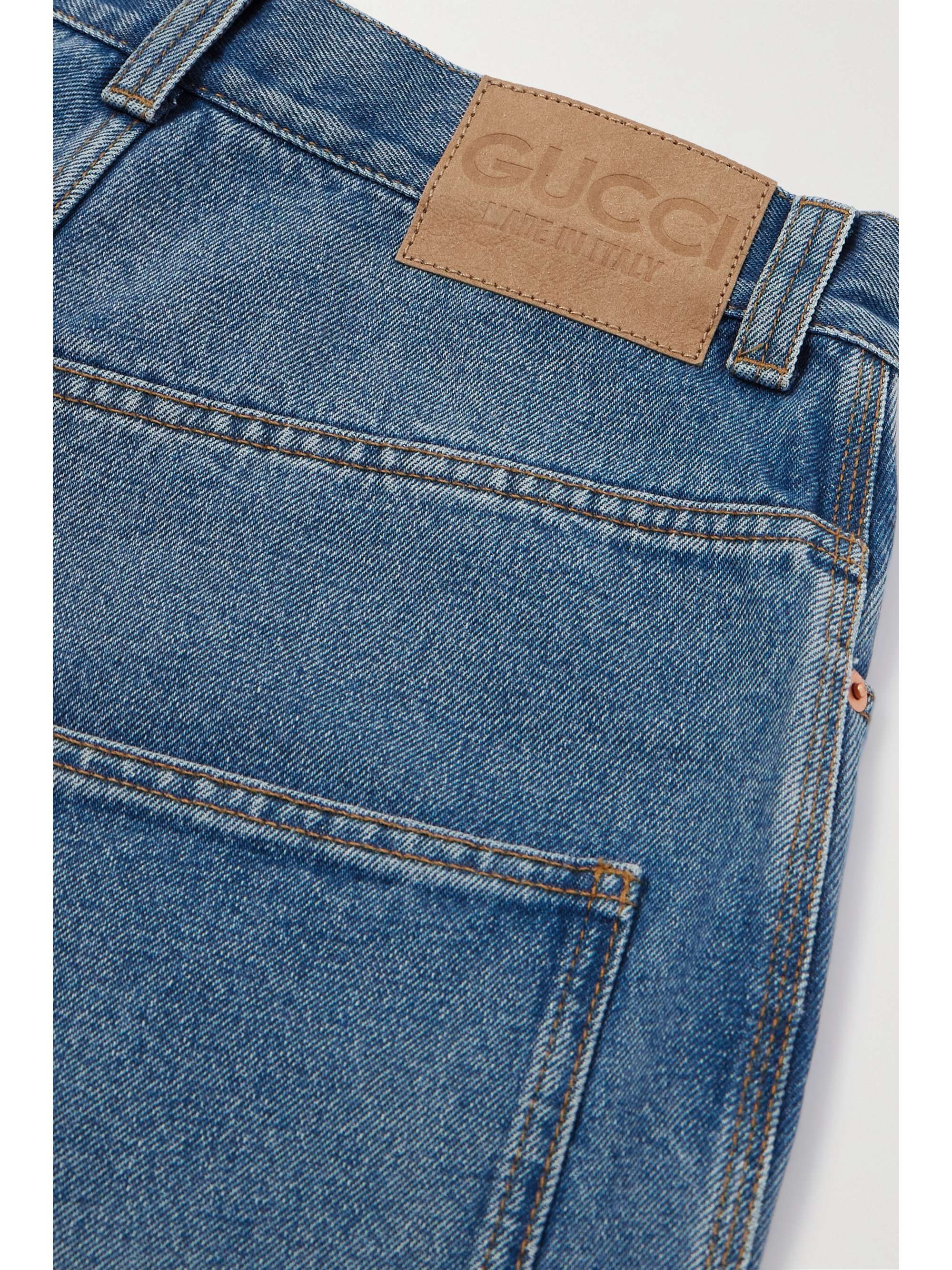 Horsebit-detailed frayed high-rise wide-leg jeans view
