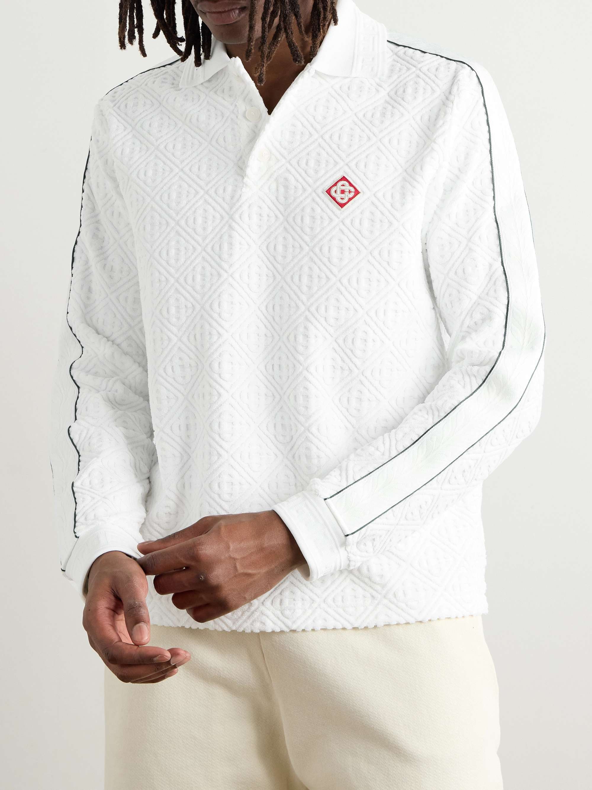 Logo-Appliquéd Striped Cotton-Blend Terry-Jacquard Polo Shirt view
