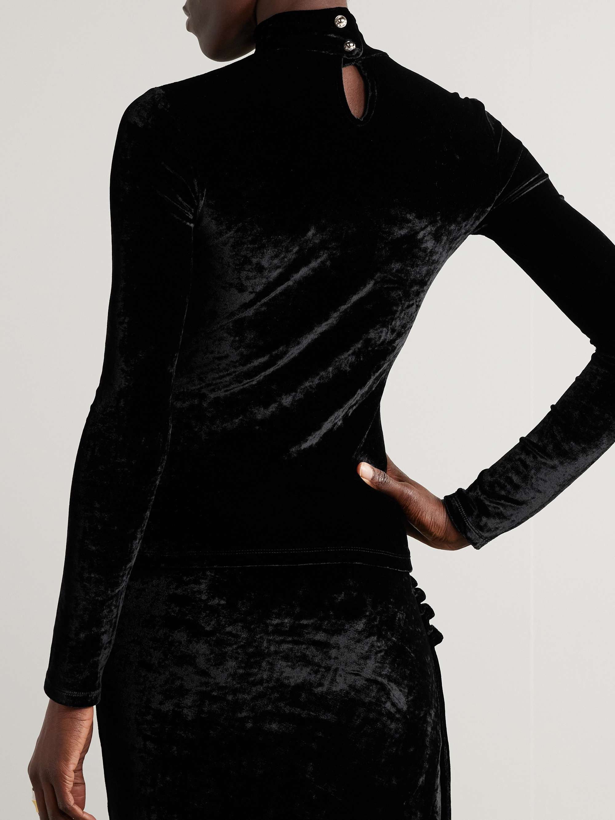 Embellished velvet turtleneck top view