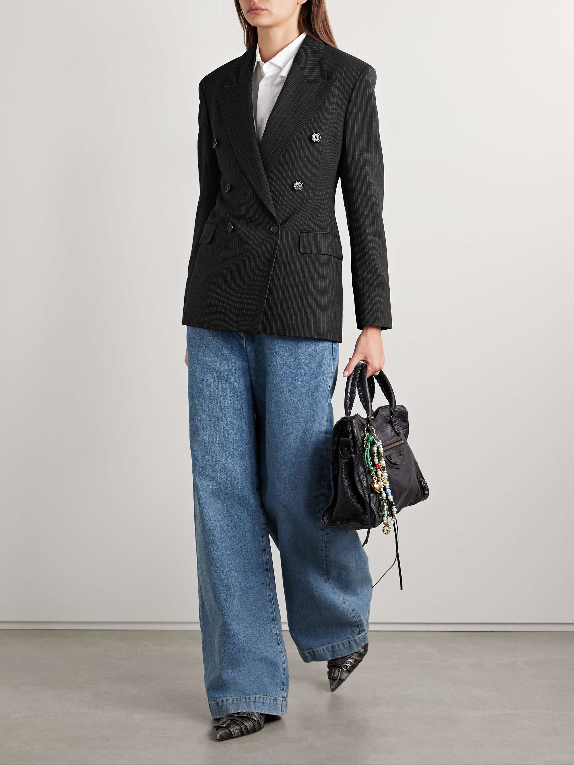 Double-breasted pinstriped wool and cotton-blend blazer view