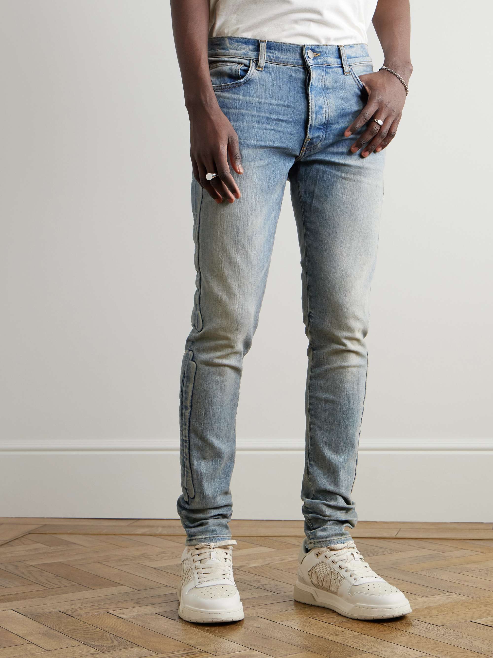 3D Bones Skinny-Fit Distressed Appliquéd Jeans view