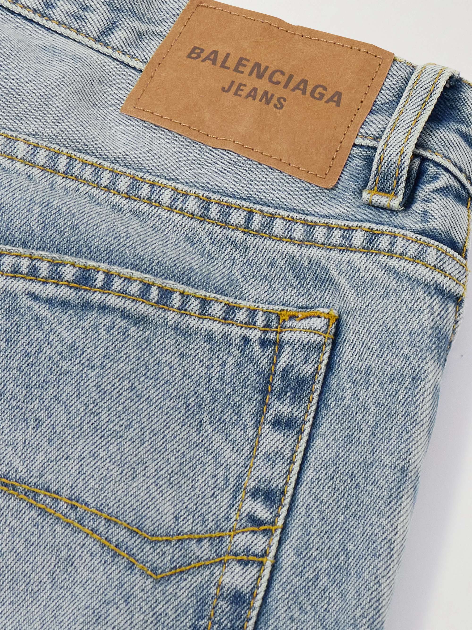 Distressed mid-rise straight-leg jeans view