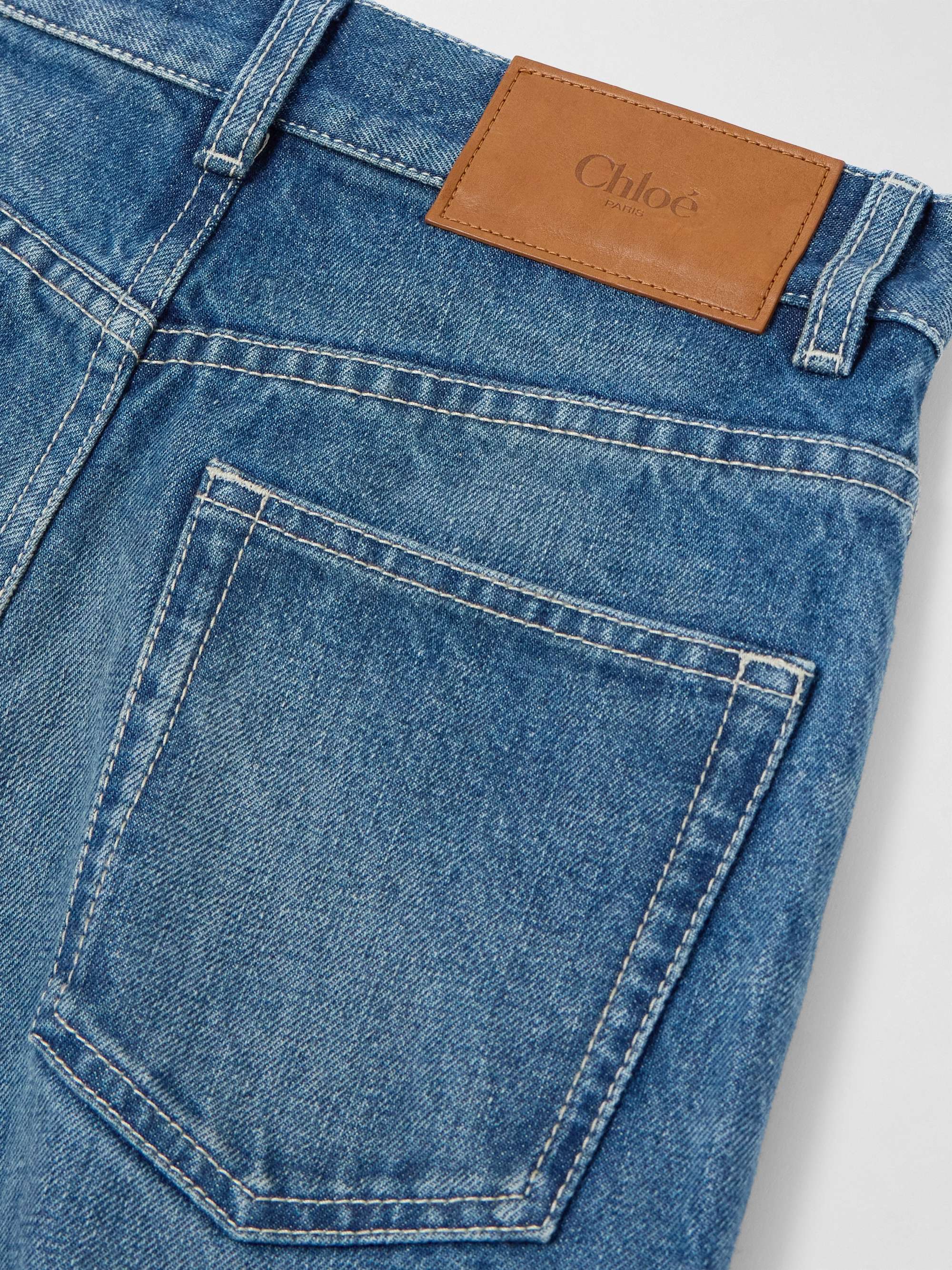 Frayed high-rise flared jeans view